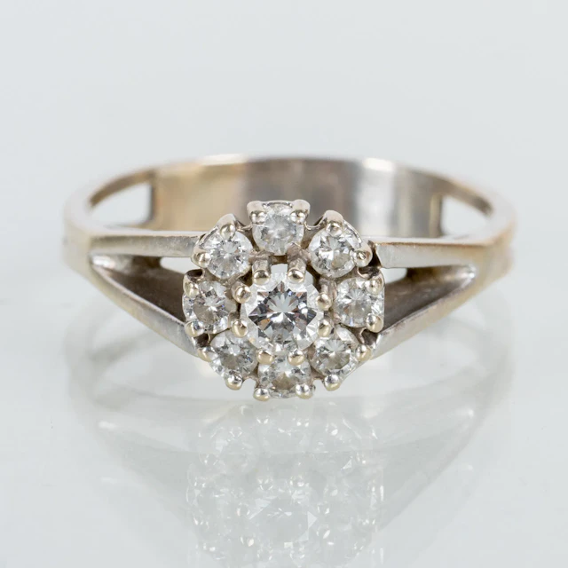 CARMOSÉRING, 14k white gold with 9 brilliant-cut diamonds, likely
