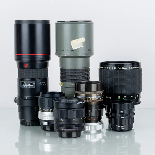 LENSES, 5 pcs, including Tukina AT-X AF400 and Sigma Mirror-Telephoto 1:5,6 400 mm
