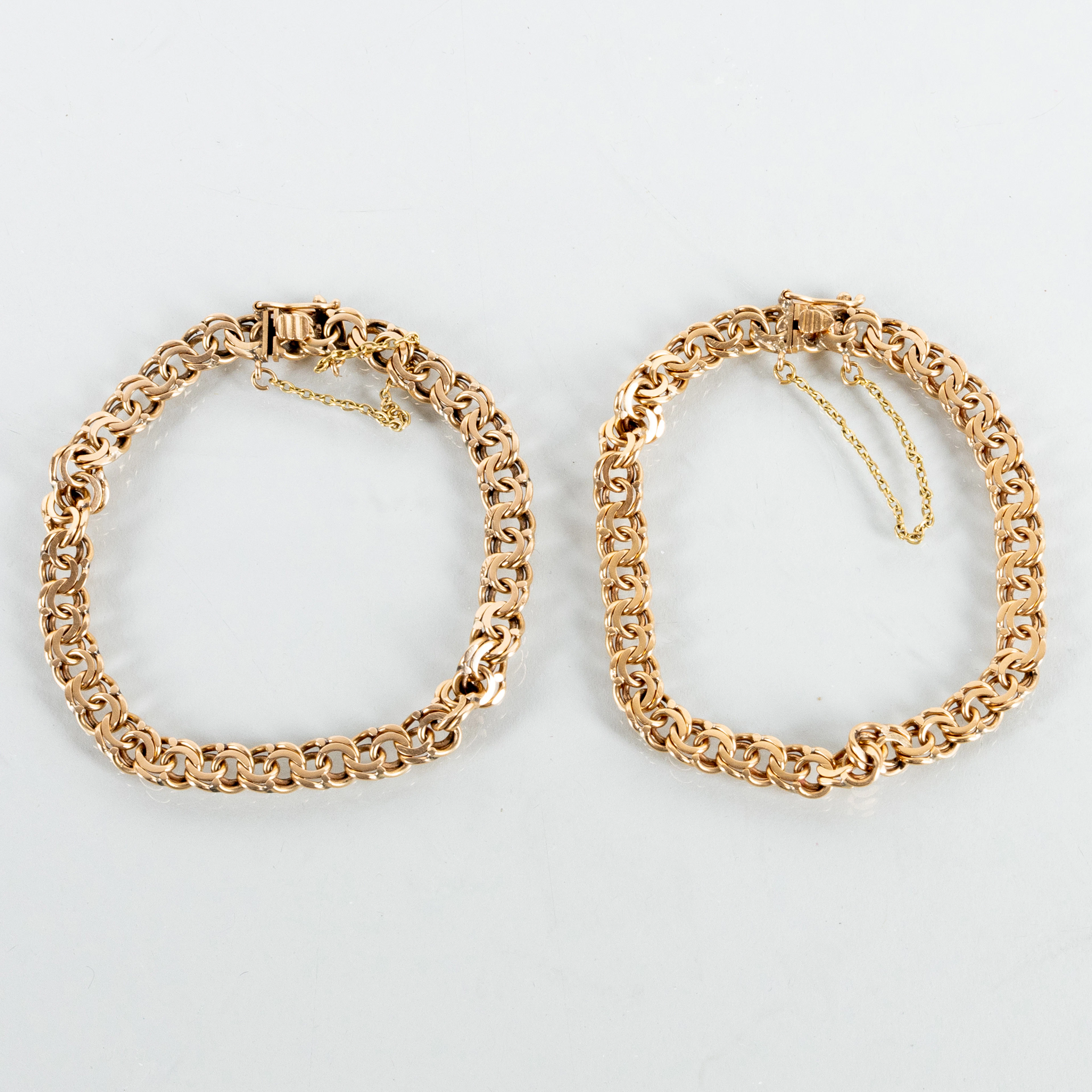BRACCIALE, 2 pz, oro 18 carati, peso tot circa 33 g