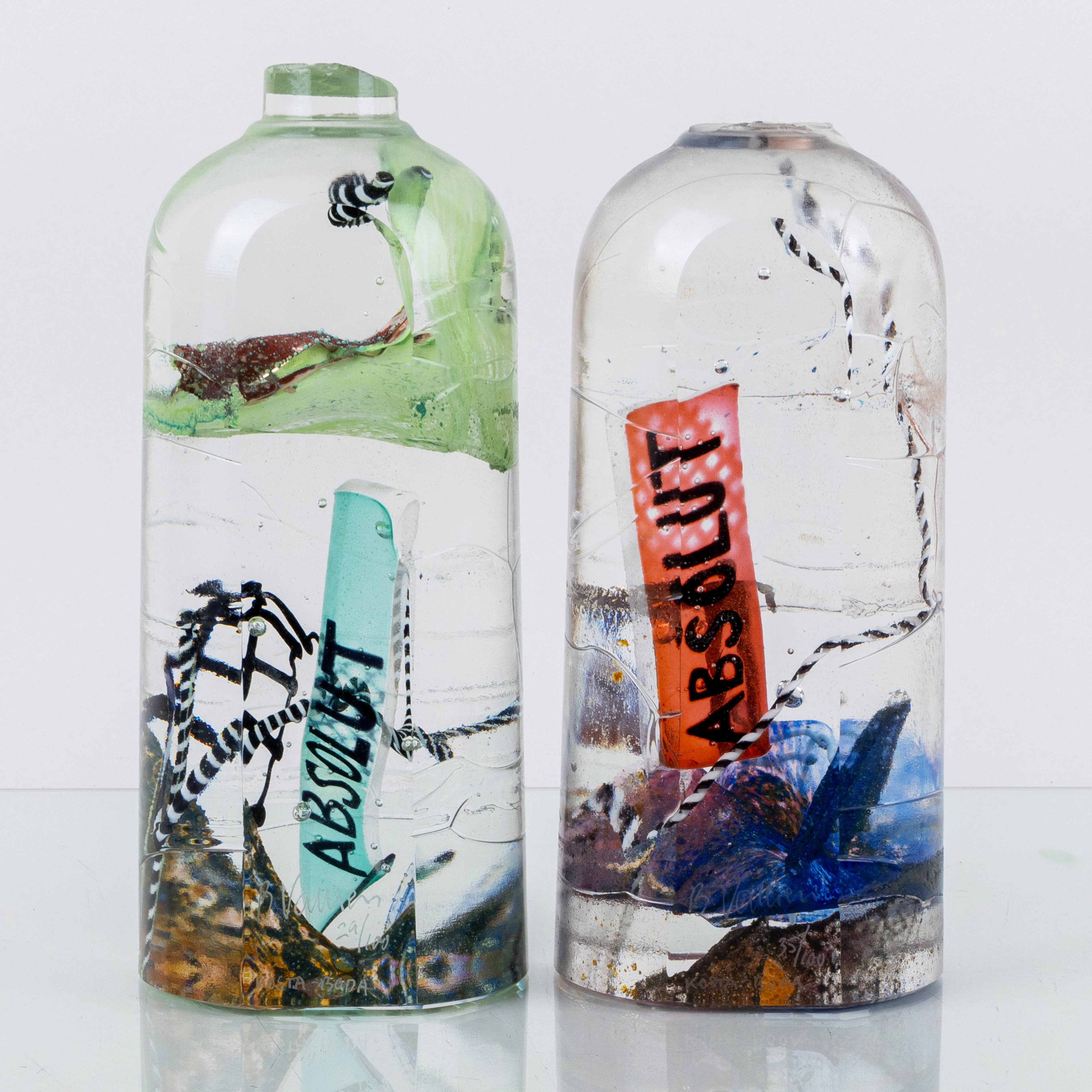 BERTIL VALLIEN, 2 sculture, vetro, "ABSOLUT", Kosta Boda, firmato