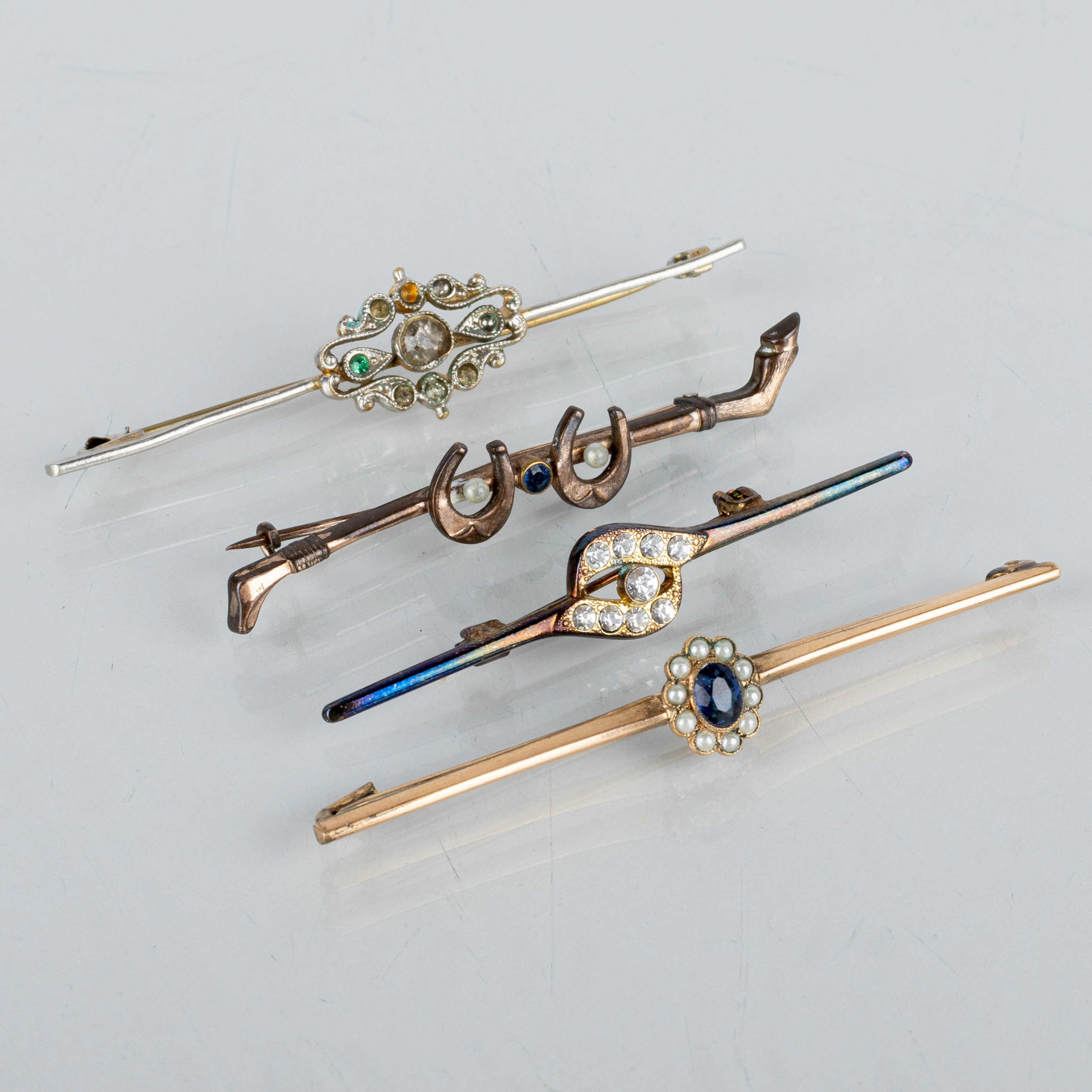SPILLE PER SPILLE, 4 pezzi, argento dorato e perle e pietre coltivate, anni 1900