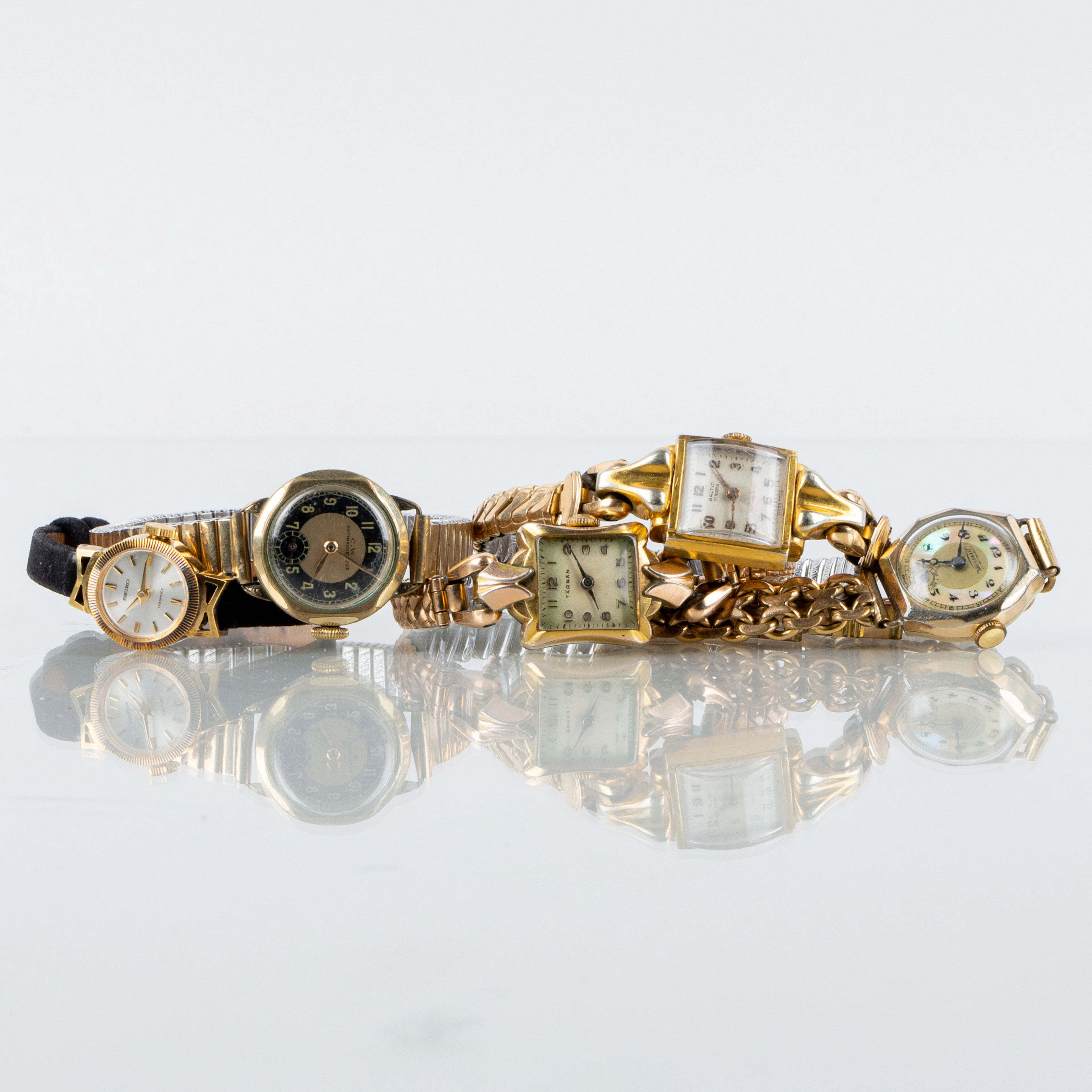 MONTRES-BRACELETS FEMMES, 5 pièces, double dorée, notamment Seiko, Tärnan, Baltic, etc
