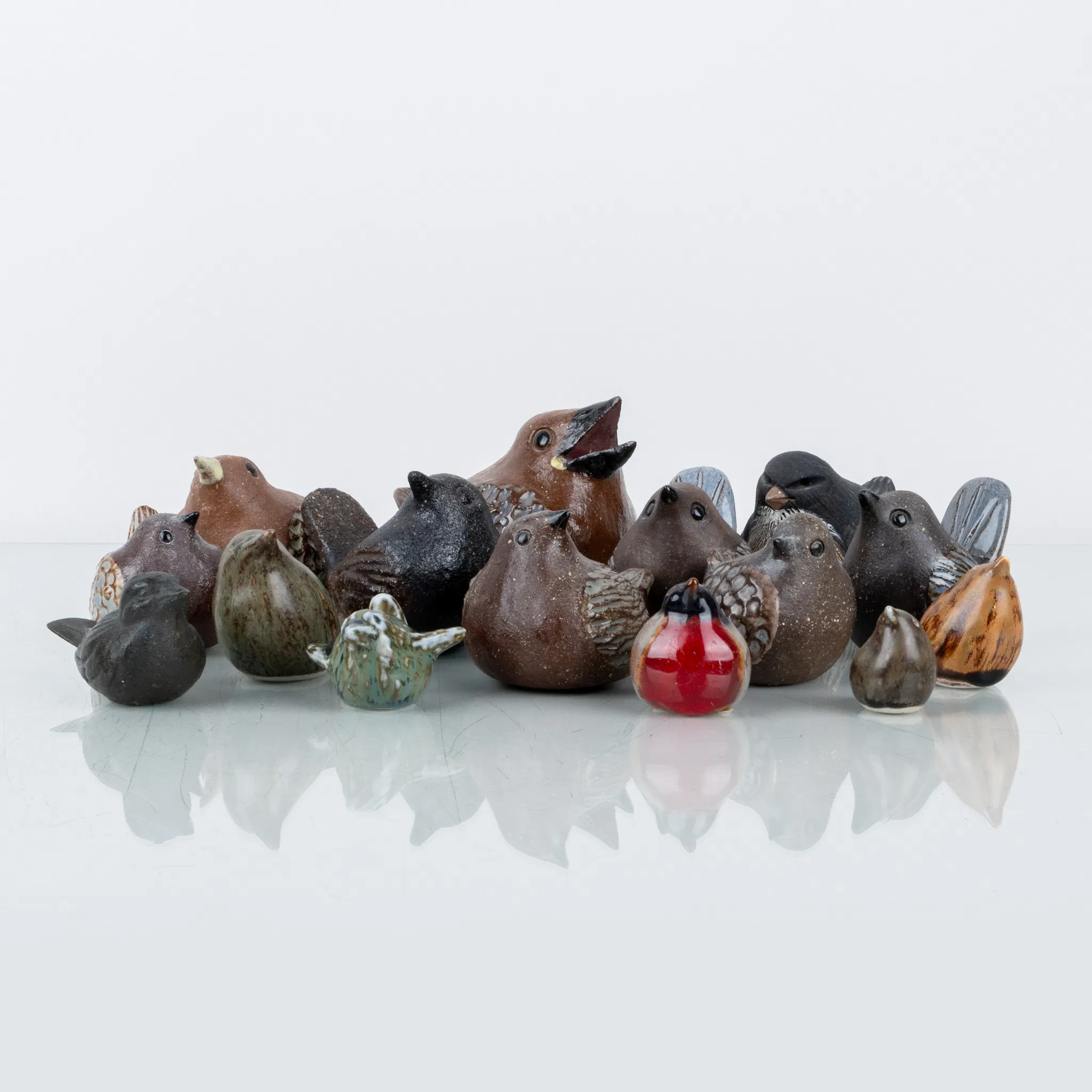 FIGURAS, 15 piezas, cerámica y hierro fundido, incluyendo Bengt Wall, Trosa y