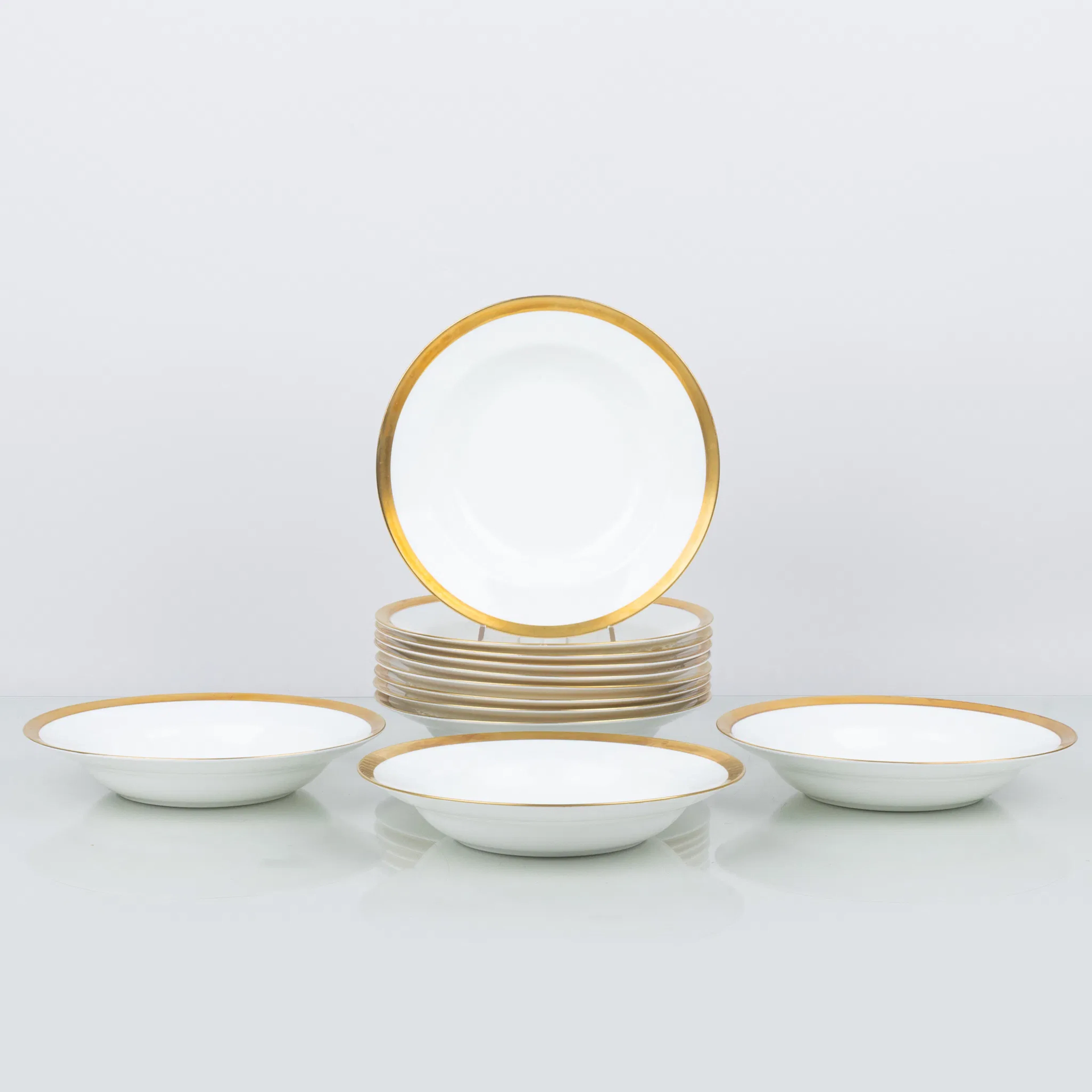 KARIN BJÖRQUIST, 12 piezas de placas profundas, porcelana ósea, "Nobel", Rörstrand