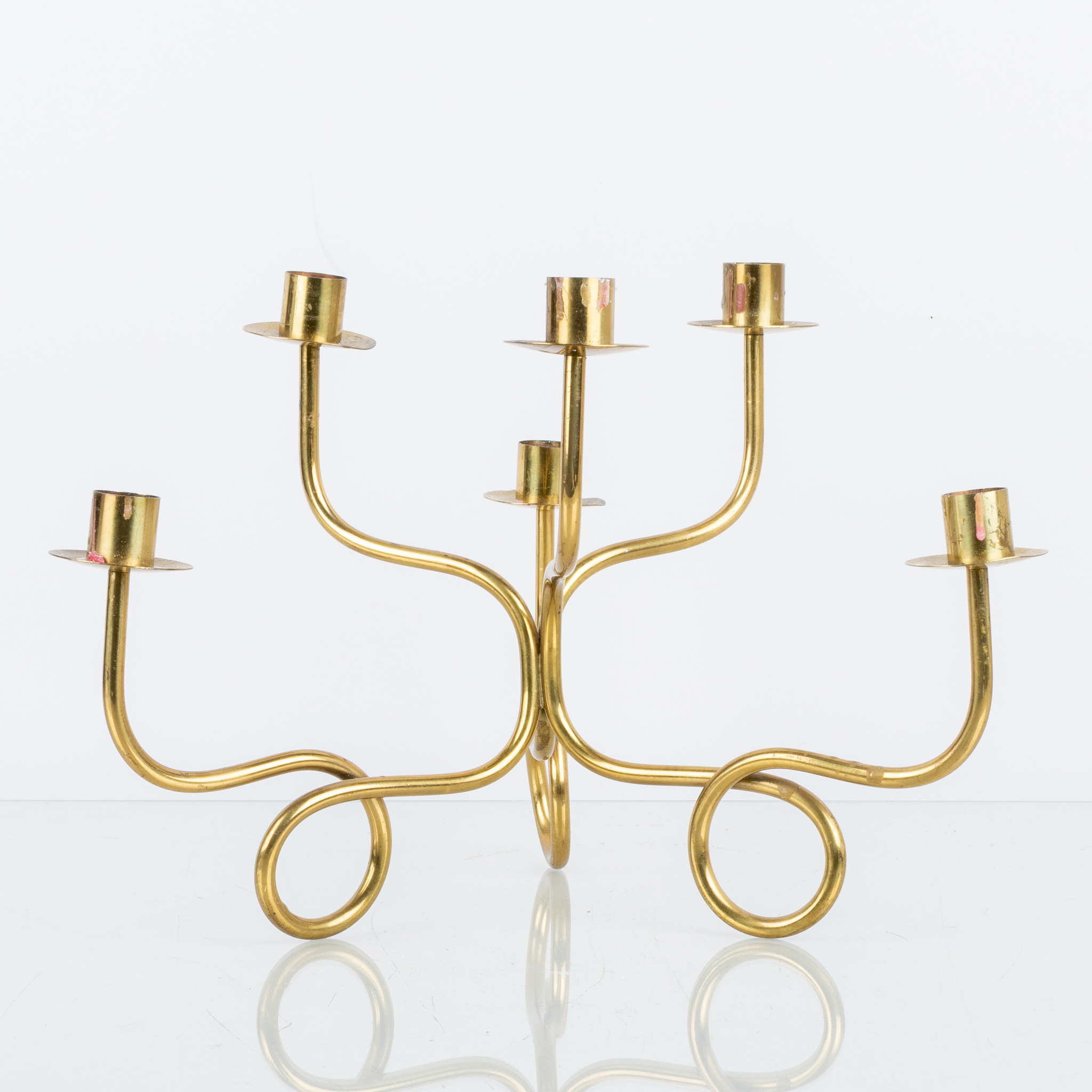 JOSEF FRANK, un candelabro de latón, Firma Svenskt Tenn, probablemente años 1900
