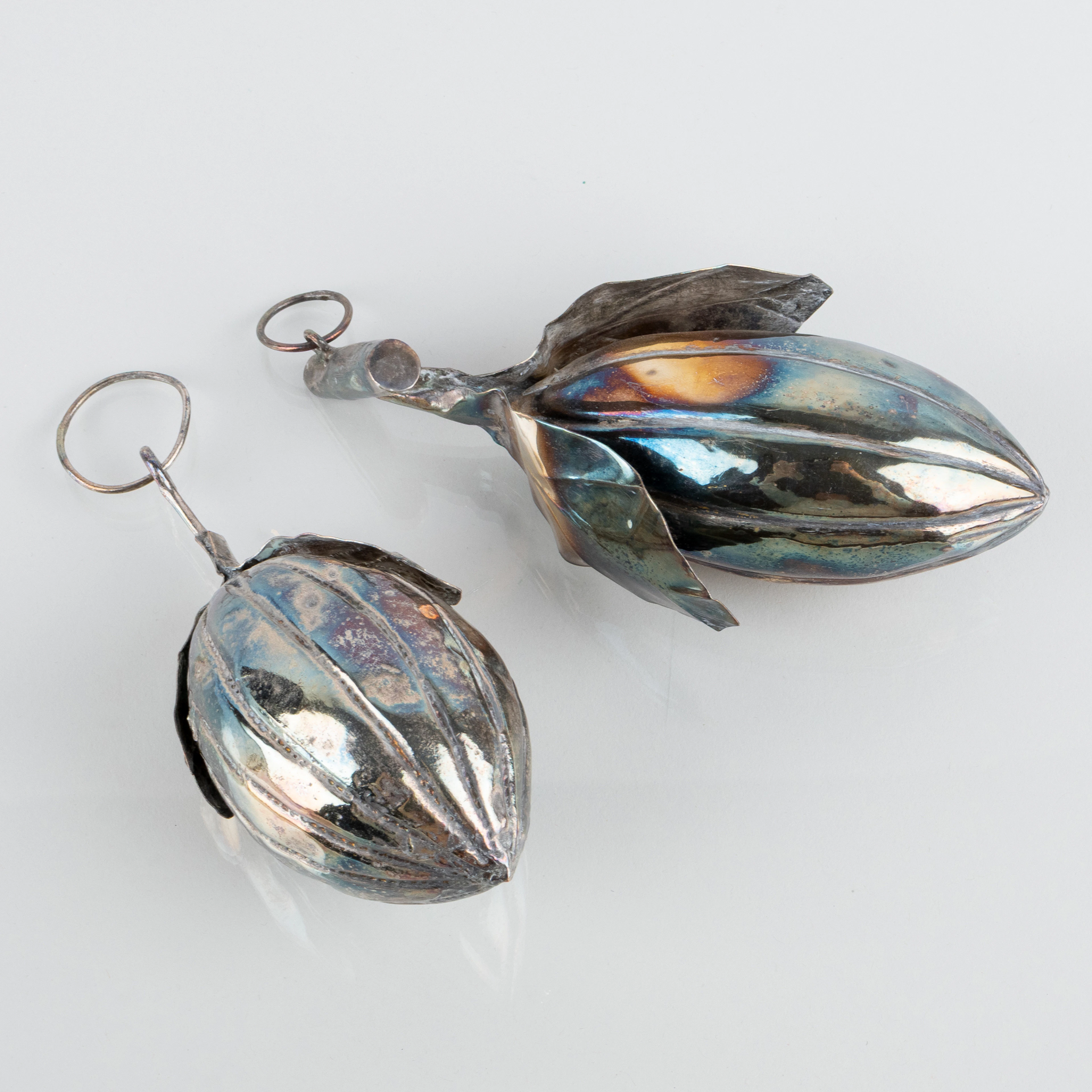 DECORATIONS, 2 pcs, silver-plated metal, probably South America, 1900s