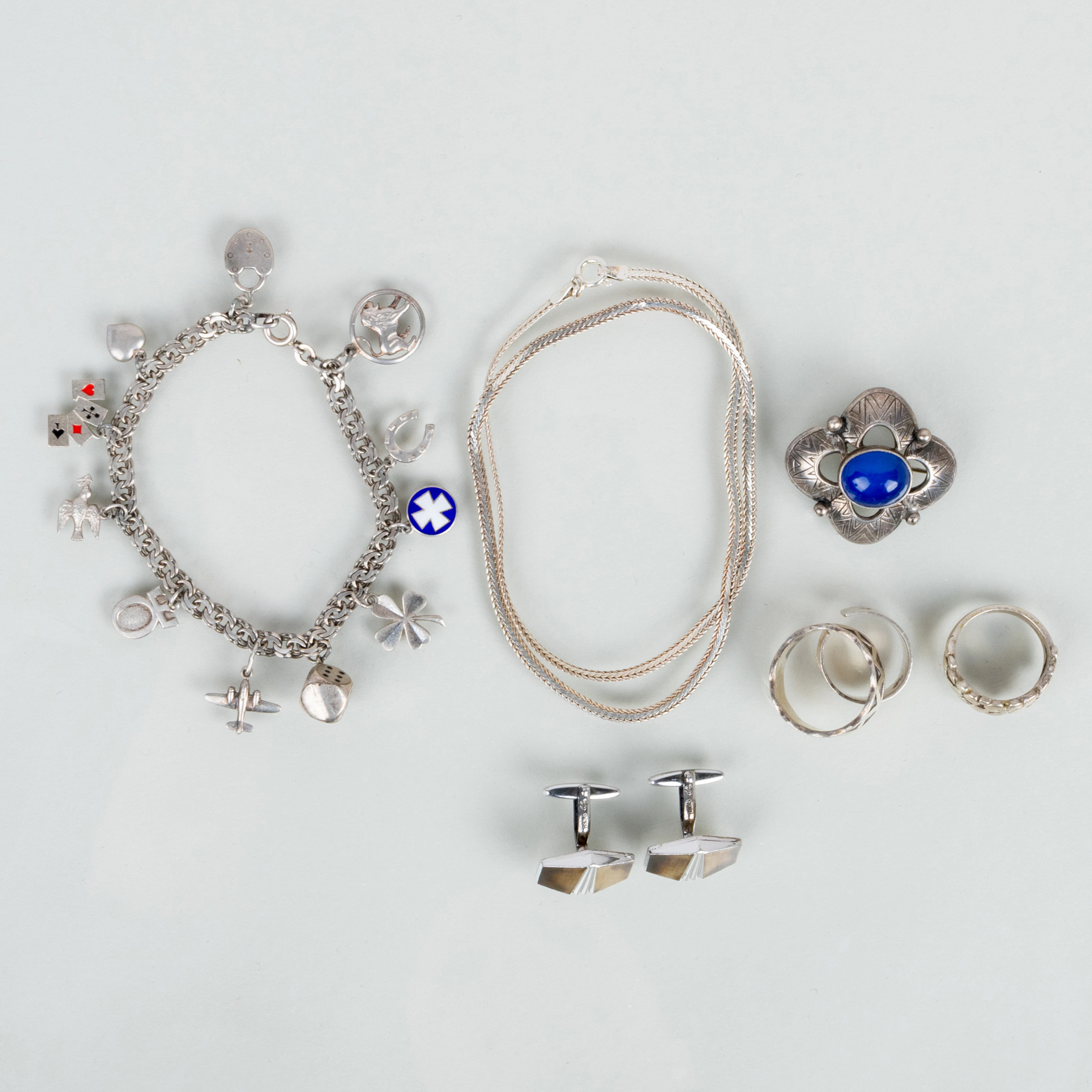 COLLEZIONE DI GIOIELLI IN ARGENTO, GEMELLI BLU, BRACCIALETTI e collane