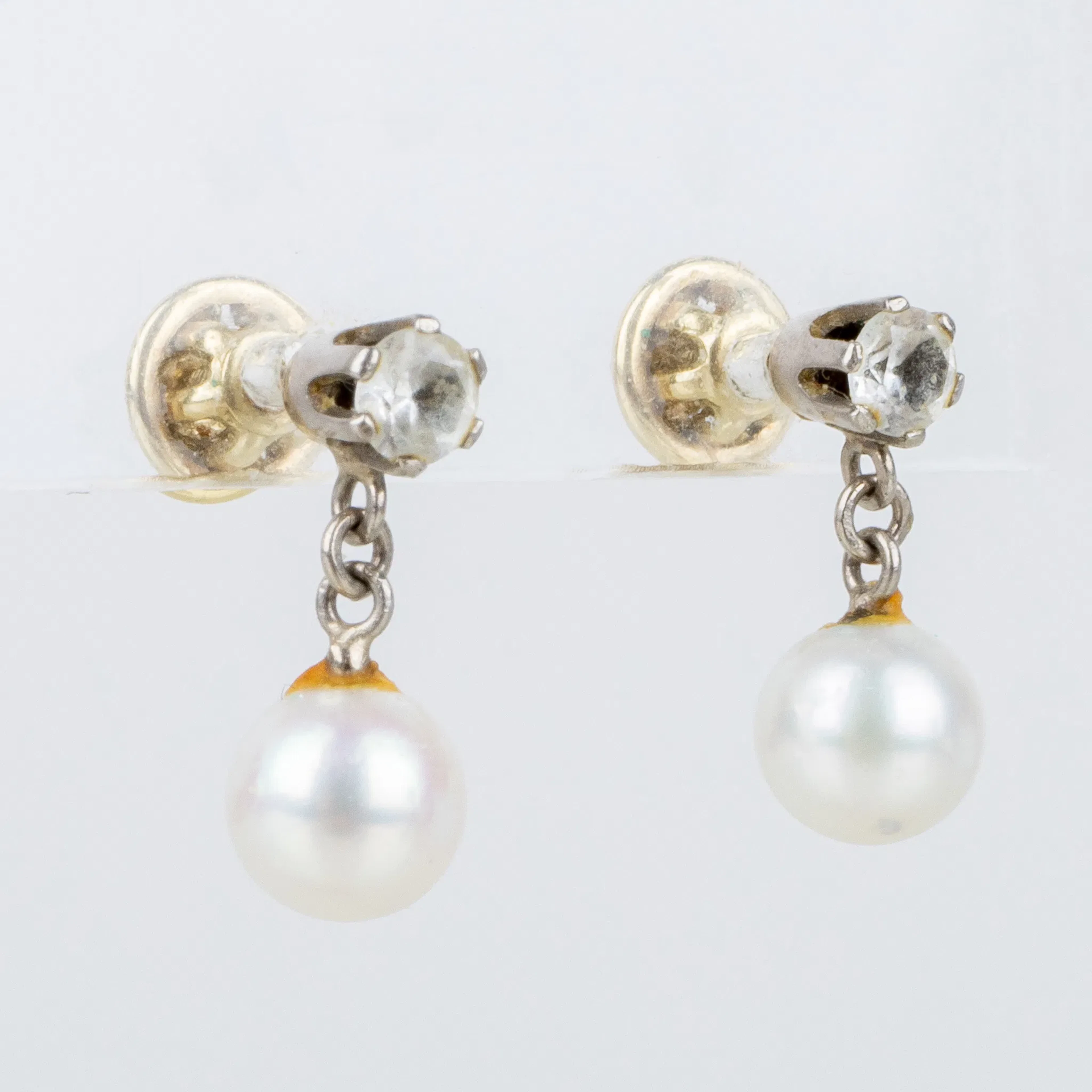 EARRINGS, 1 pair, 18k gold and white gold, with cultured pearls and white stones
