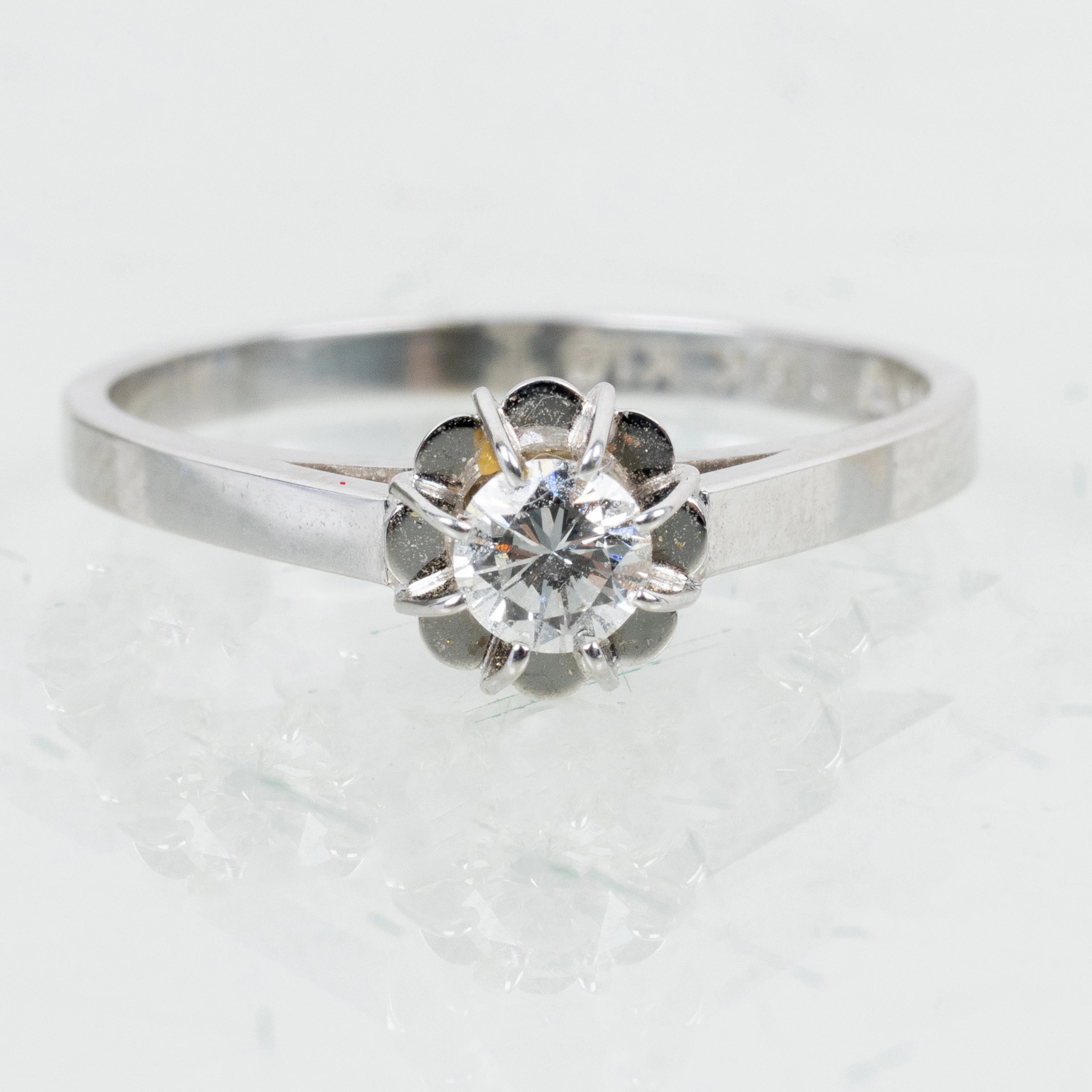 RING, 18-karat-Weißgold, mit Diamant ca. 0,16 ct, GFAB, 1984, Gewicht ca. 2 g
