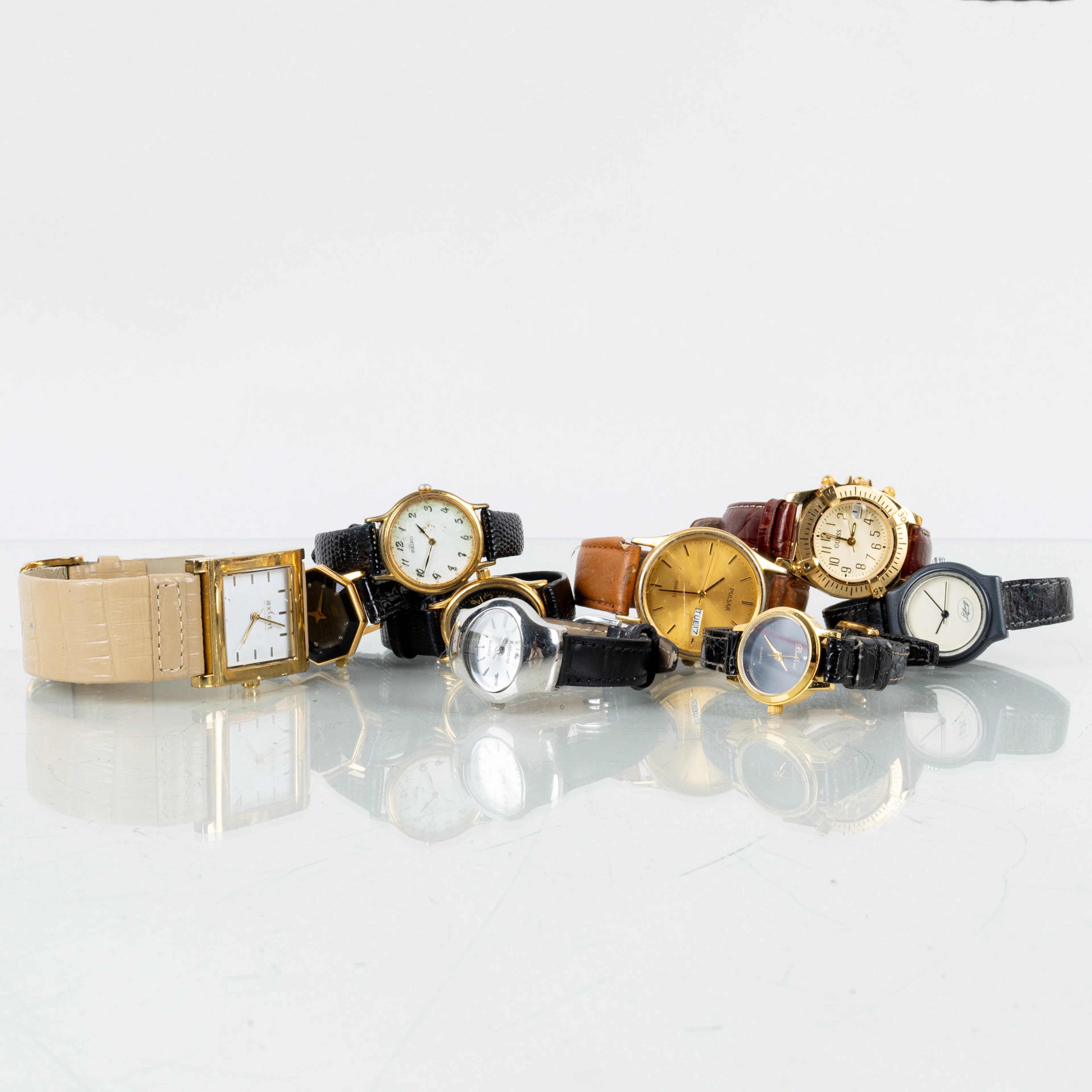 COLECCIÓN DE RELOJES DE PULSERA, 9 piezas, metal blanco y amarillo, incluyendo Seiko, Axcent, Pulsar