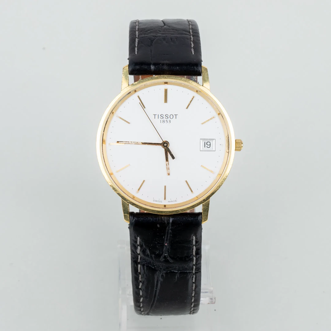 RELOJ DE PULSERA MASCULINO, oro de 18 quilates, Tissot, la segunda mitad del siglo XX
