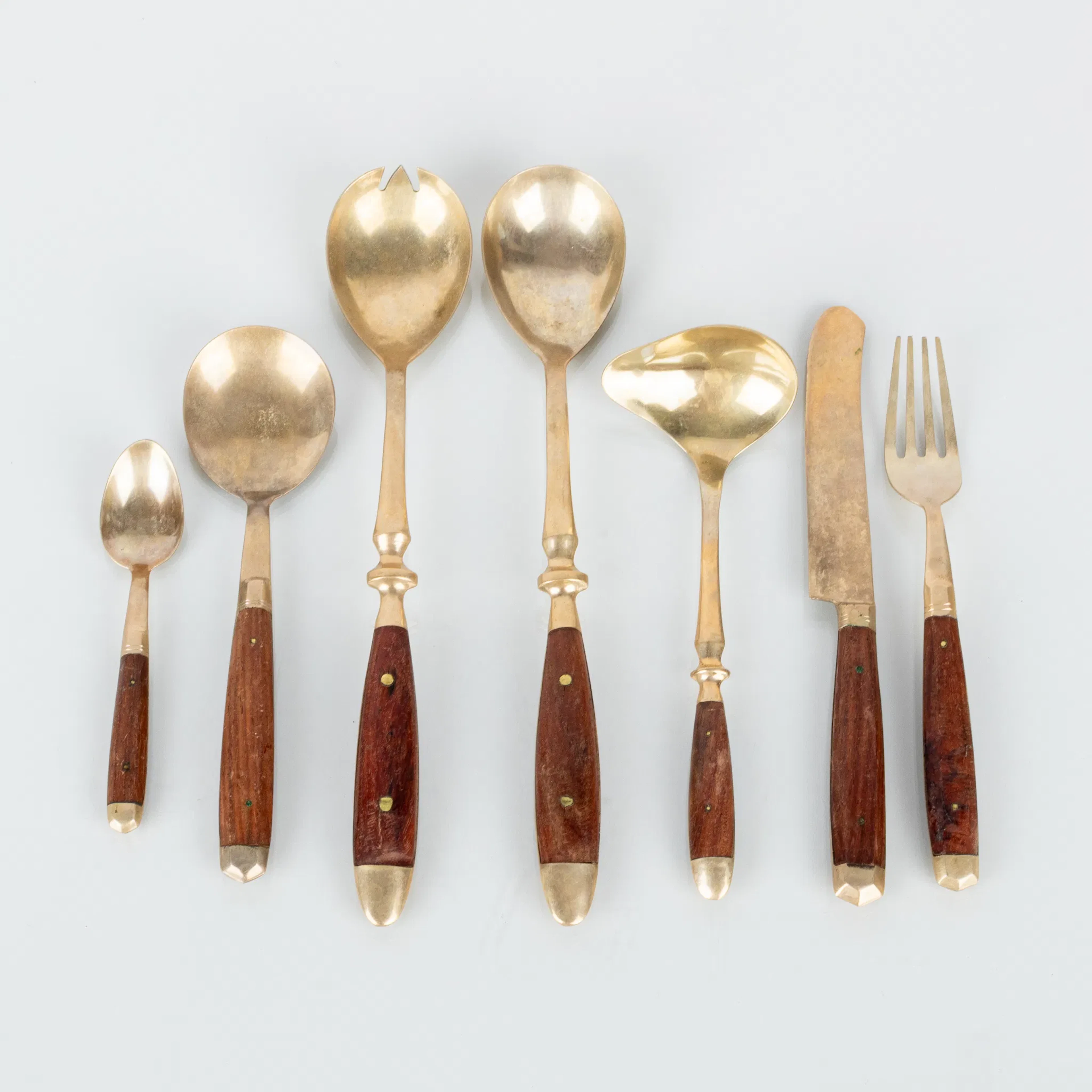 CUTLERY SET, 51 pieces, brass and wood, 1900s