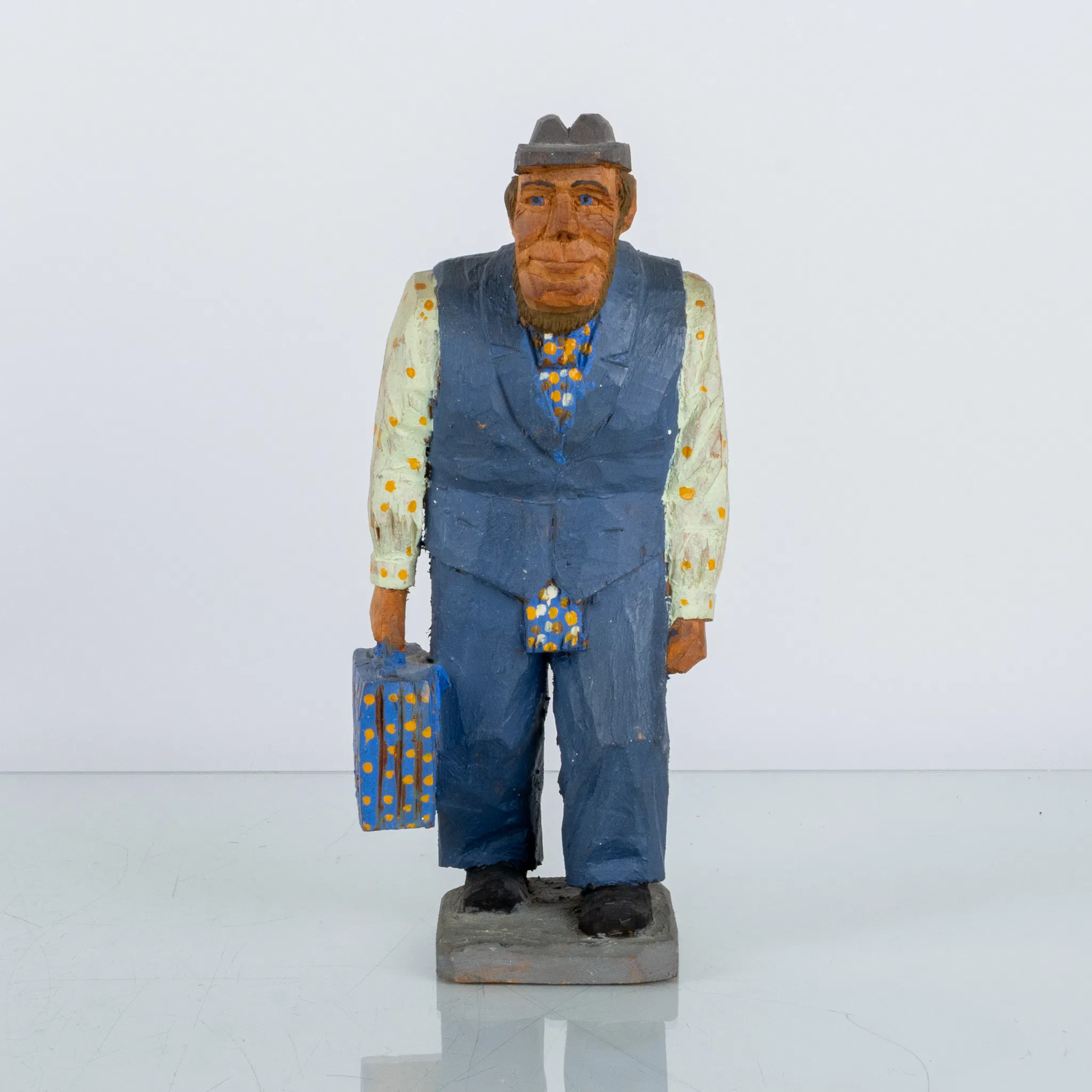 FIGURE, cut and painted wood, monogrammed signed VF