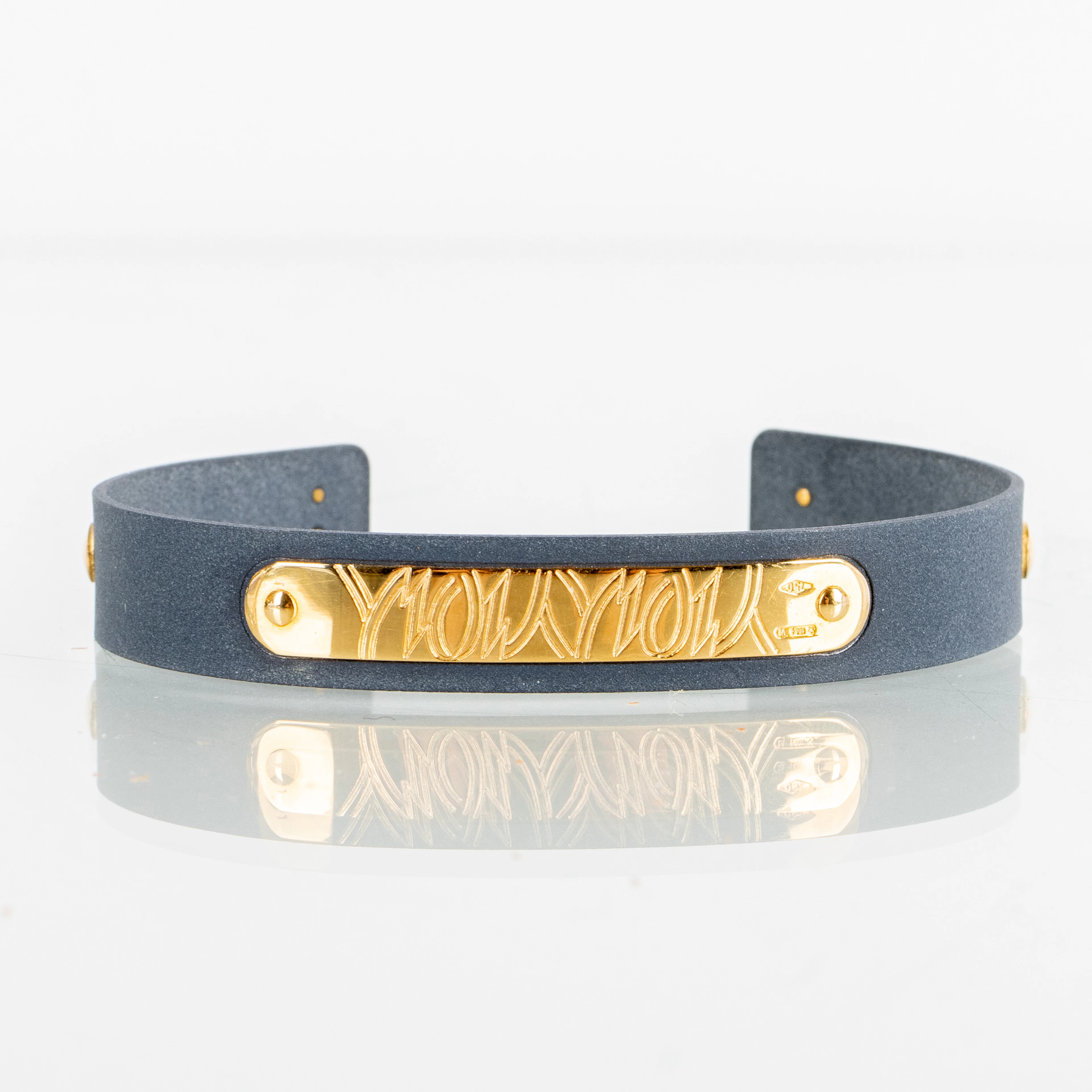 BRACCIALE in metallo e oro 18 carati