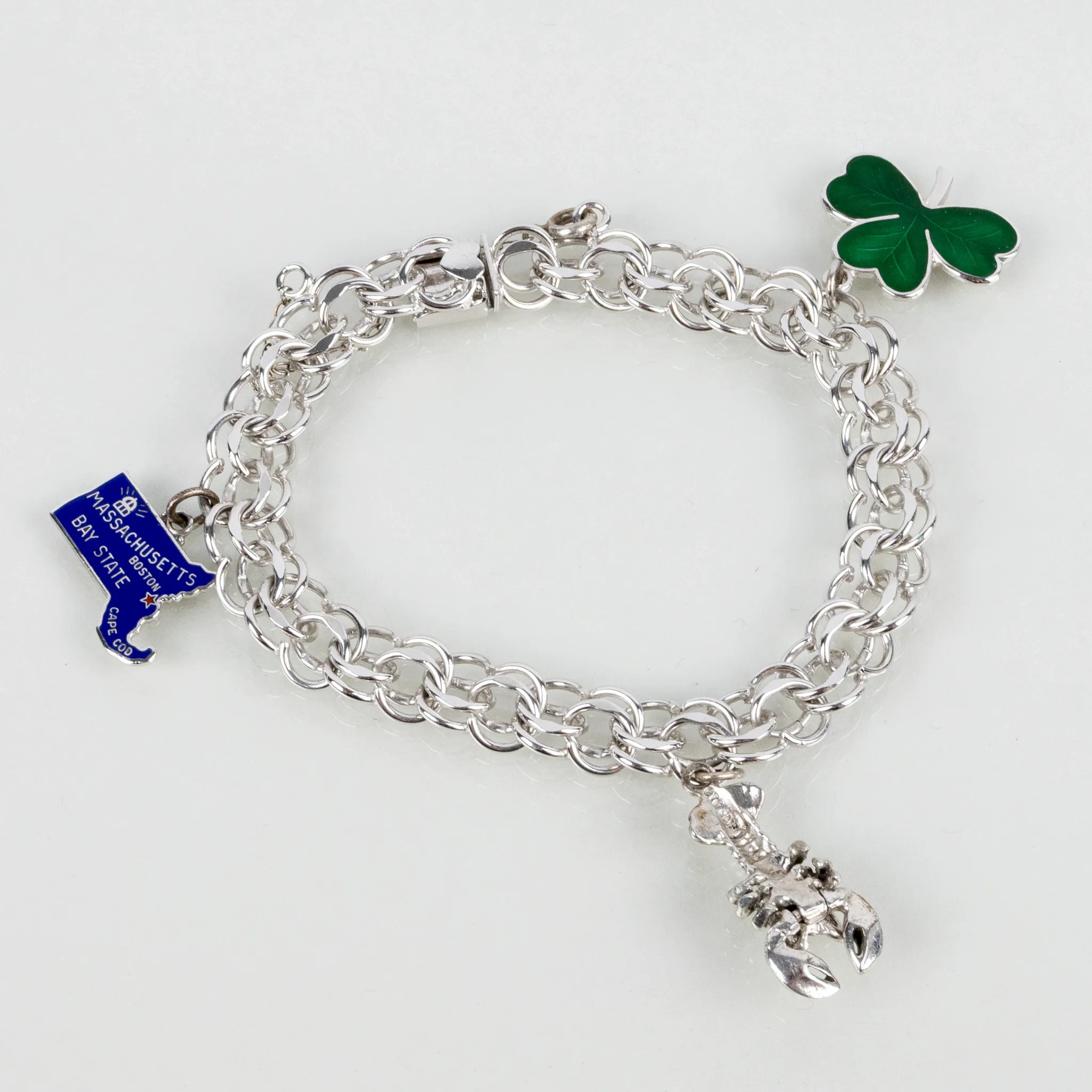 PULSERA, con dijes, plata de ley