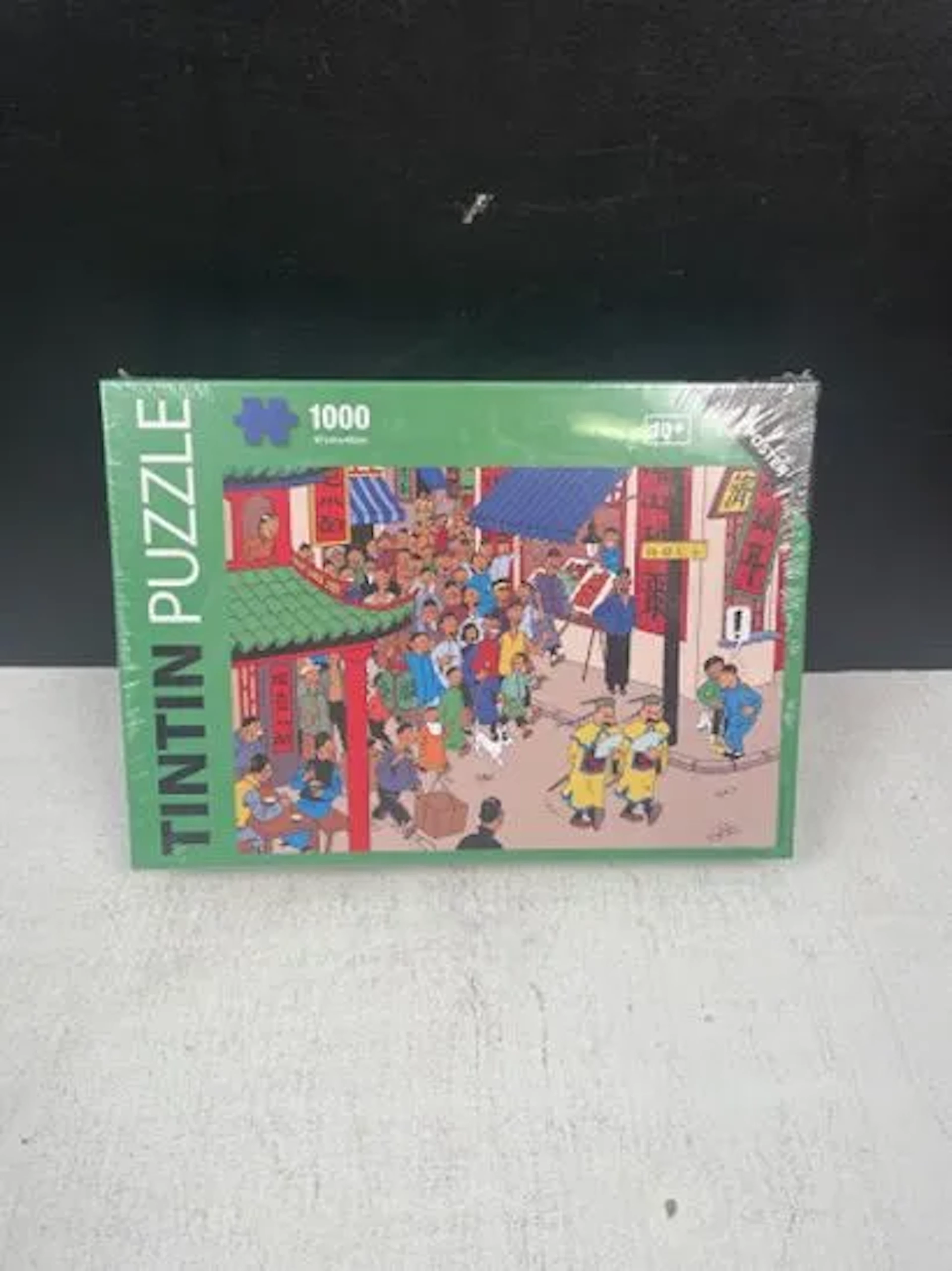 TINTIN (Hergé) - Puzzle 1000 pièces : Les rues de Shanghai / - Lot 238