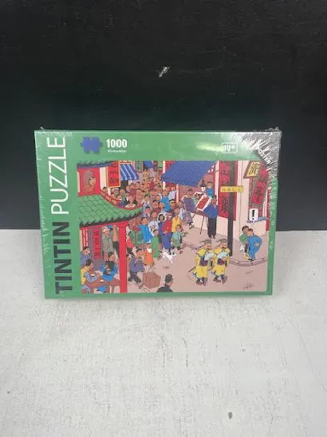 TINTIN (Hergé) - Puzzle 1000 pièces : Les rues de Shanghai / - Lot 238