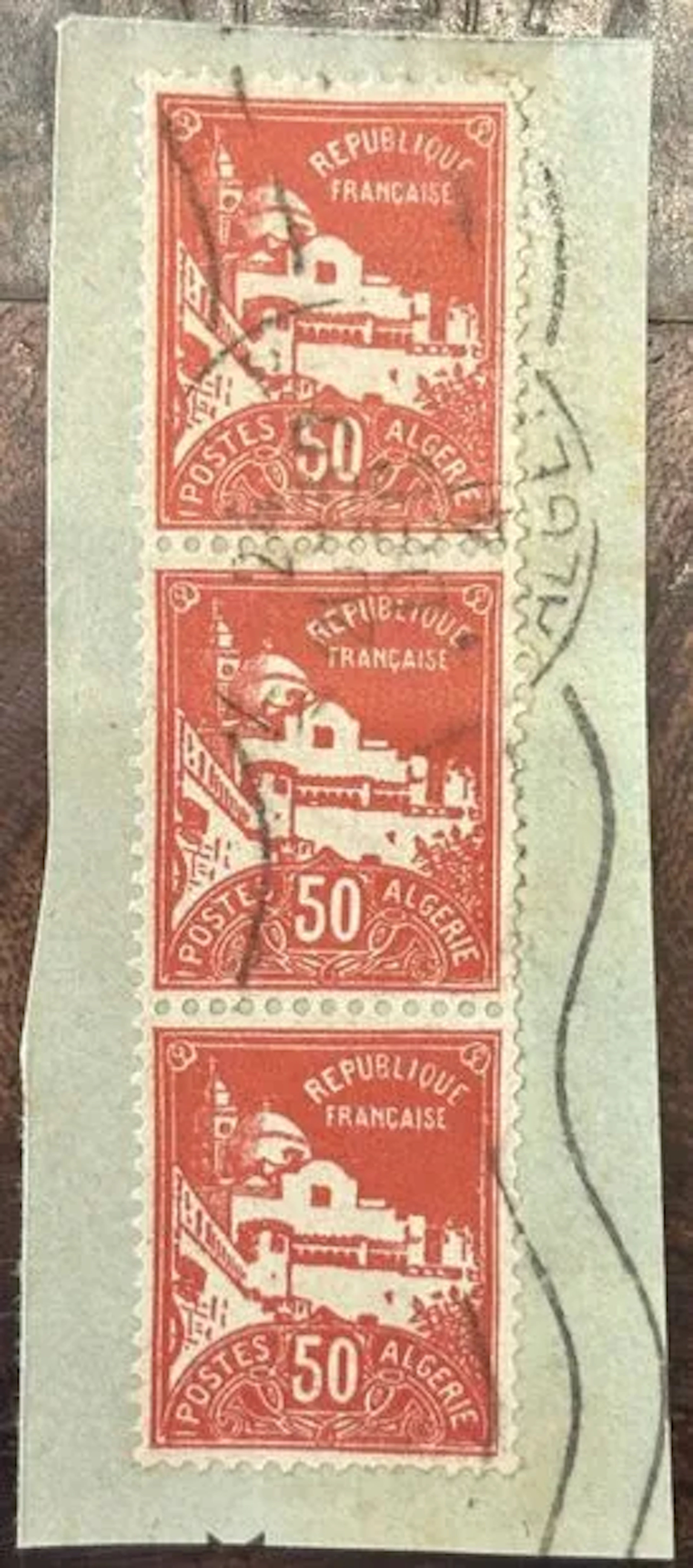 ALGERIA — 50 c red — vertical strip of three - Lot 3