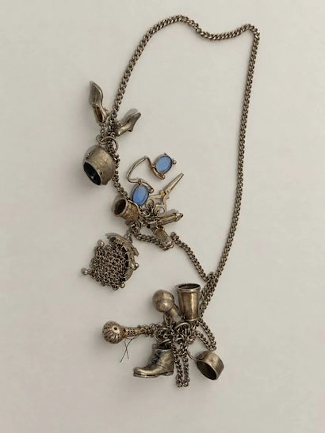 SILVER CHARMS NECKLACE - Lot 118