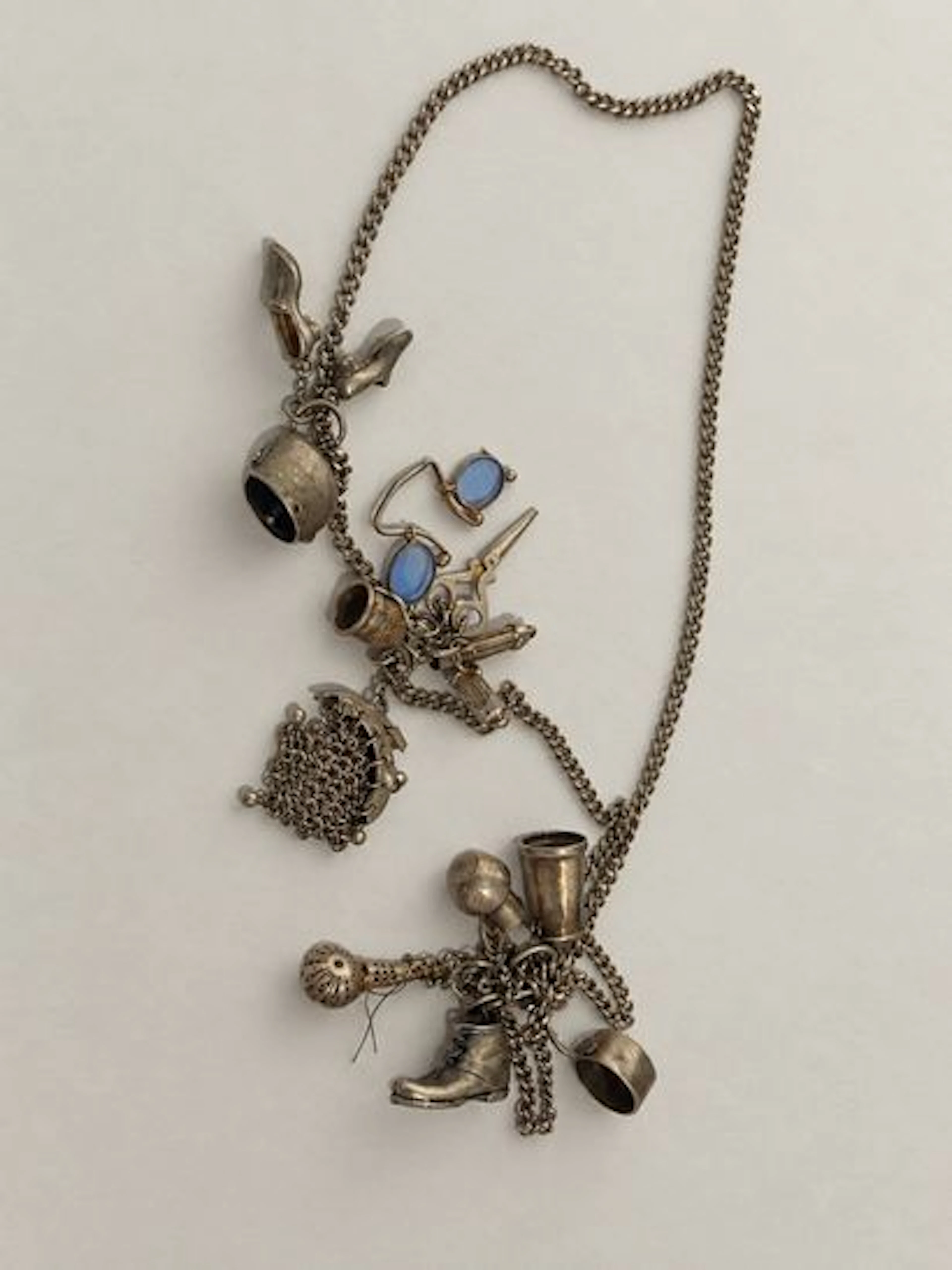 SILVER CHARMS NECKLACE - Lot 118