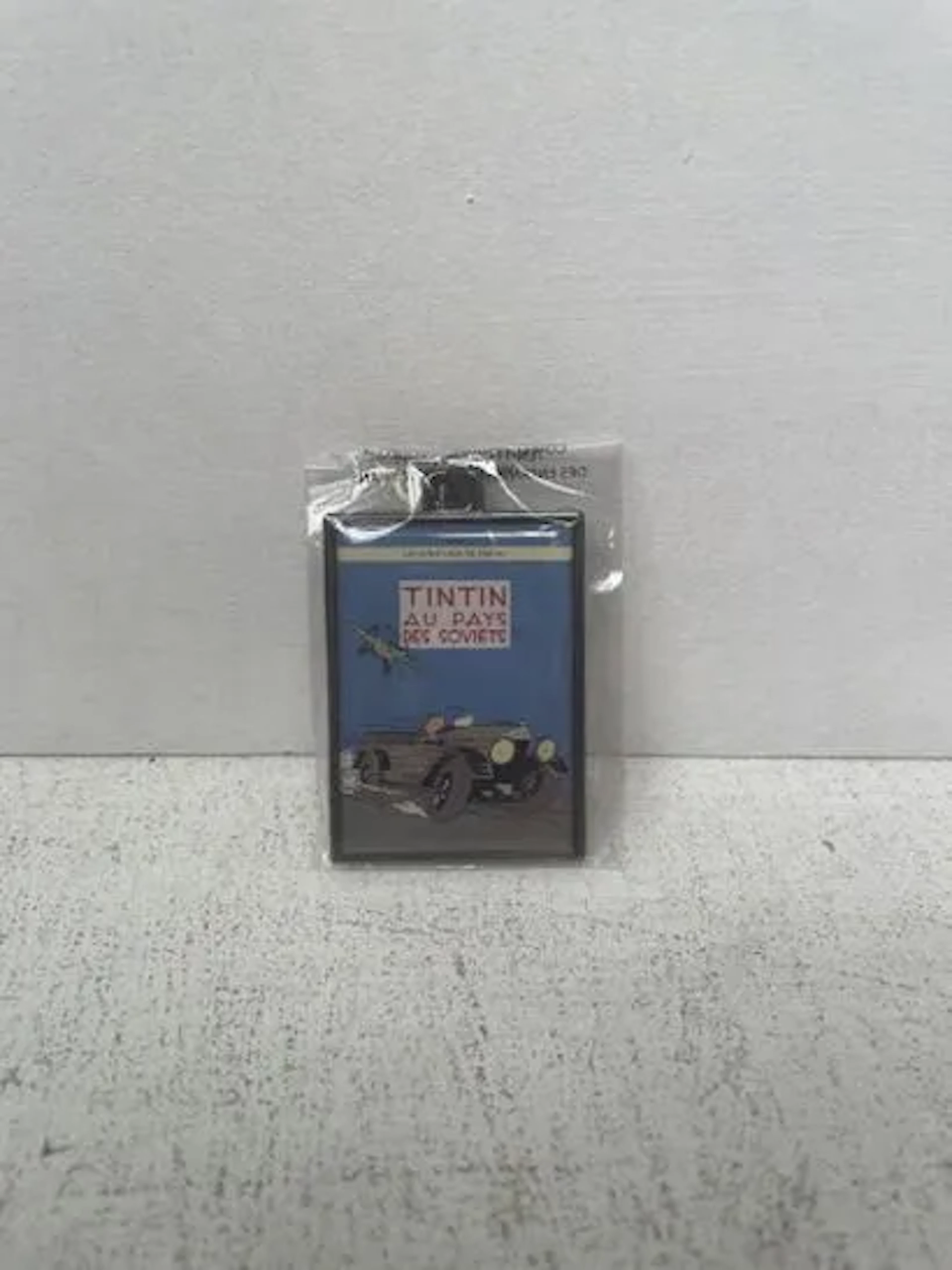Collectible Metal Keychain - Tintin "In the Land of the Sovi - Lot 252