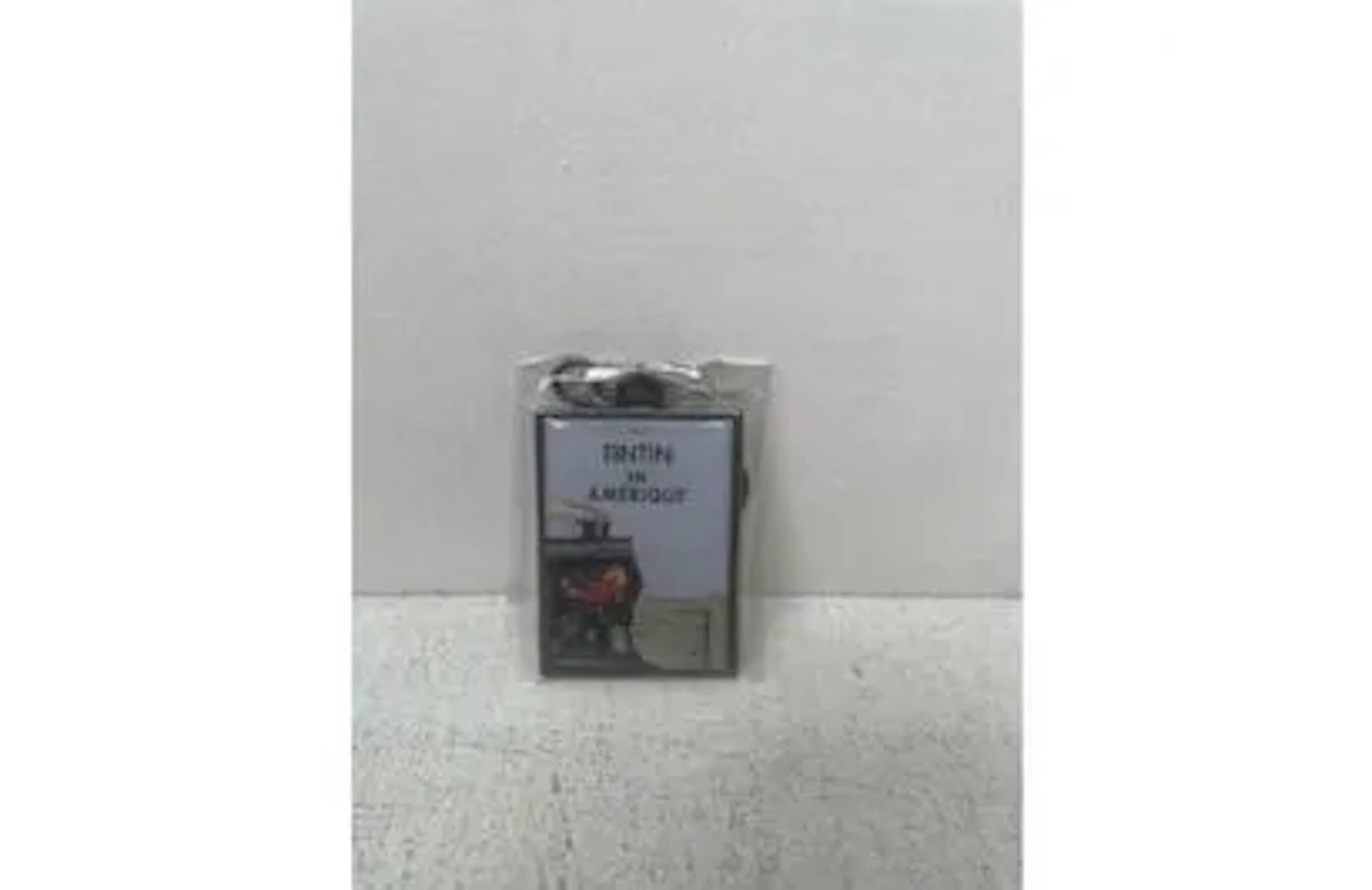 Collectible Metal Keychain - Tintin "Tintin in America" - Al - Lot 277
