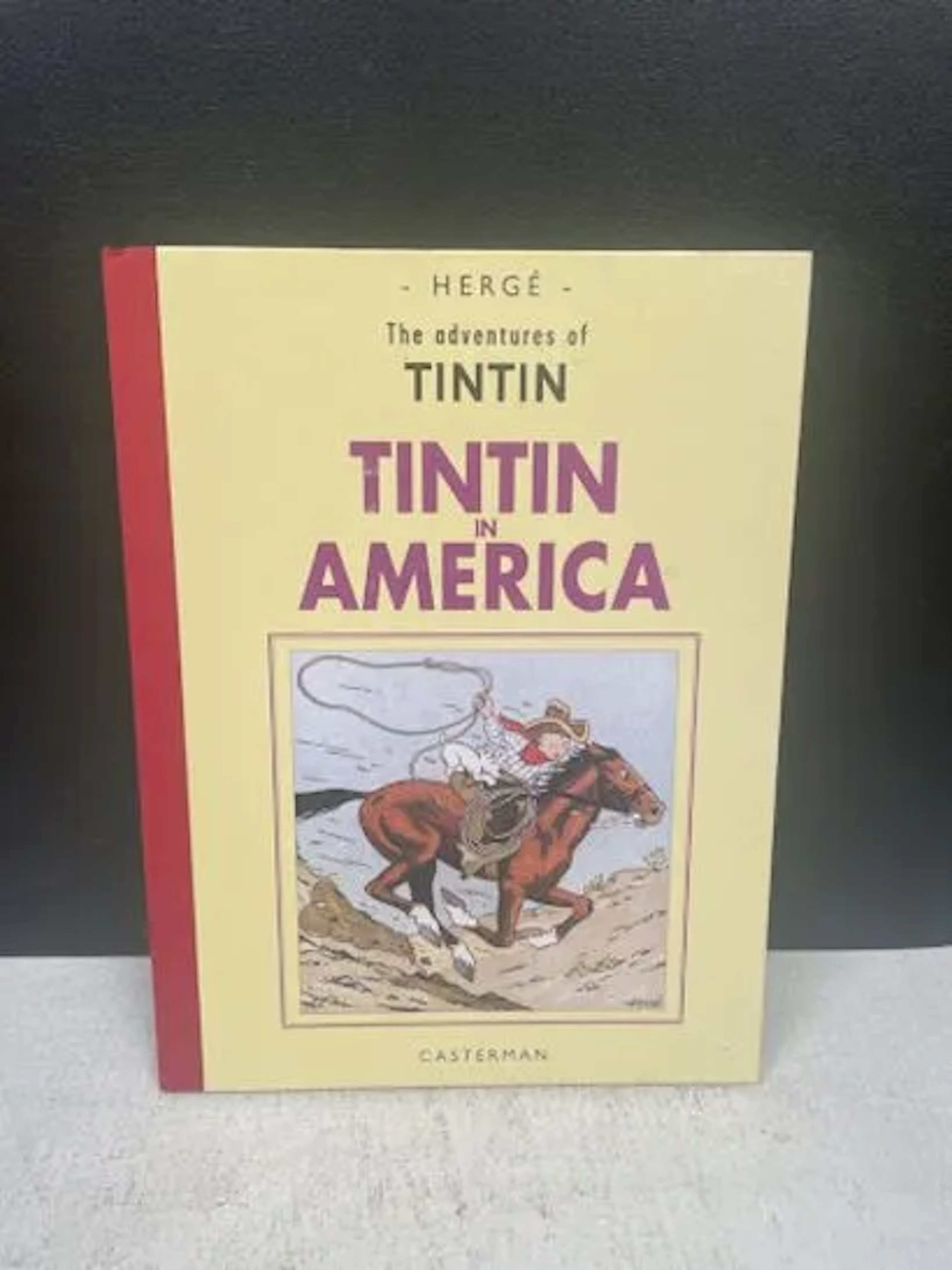TINTIN (Hergé) - English-language hardcover album: Tintin in - Lot 212
