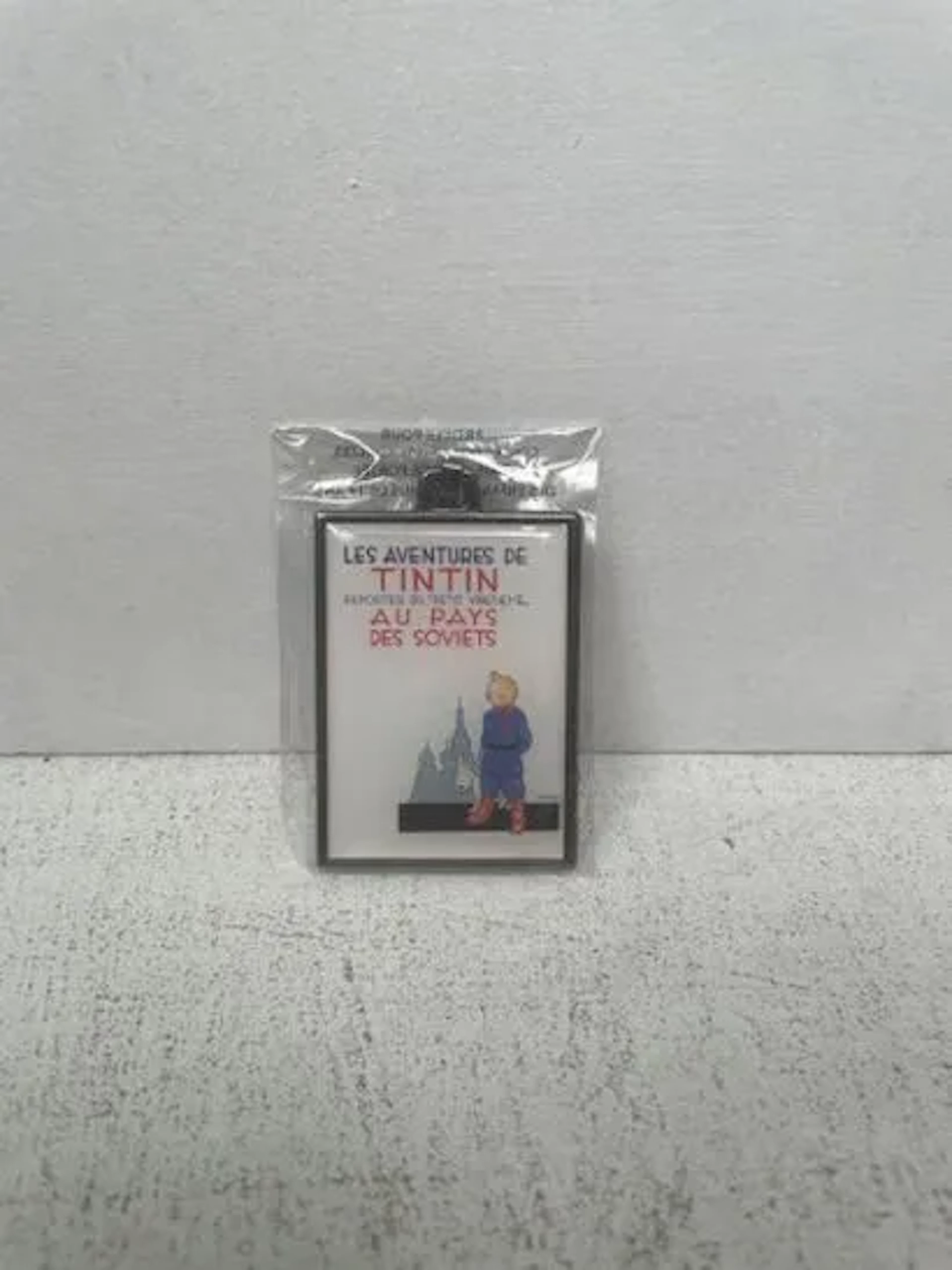 Collectible Metal Keychain - Tintin "In the Land of the Sovi - Lot 251