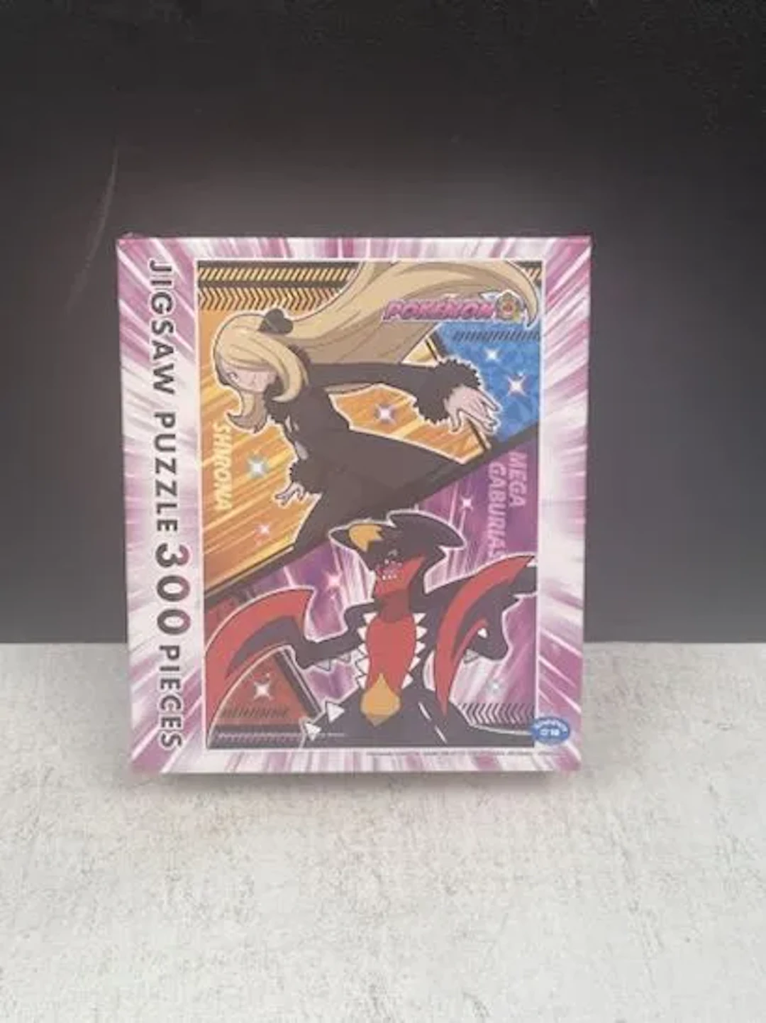 POKÉMON - Puzzle officiel 300 pièces : Cynthia & Méga-Carcha - Lot 173
