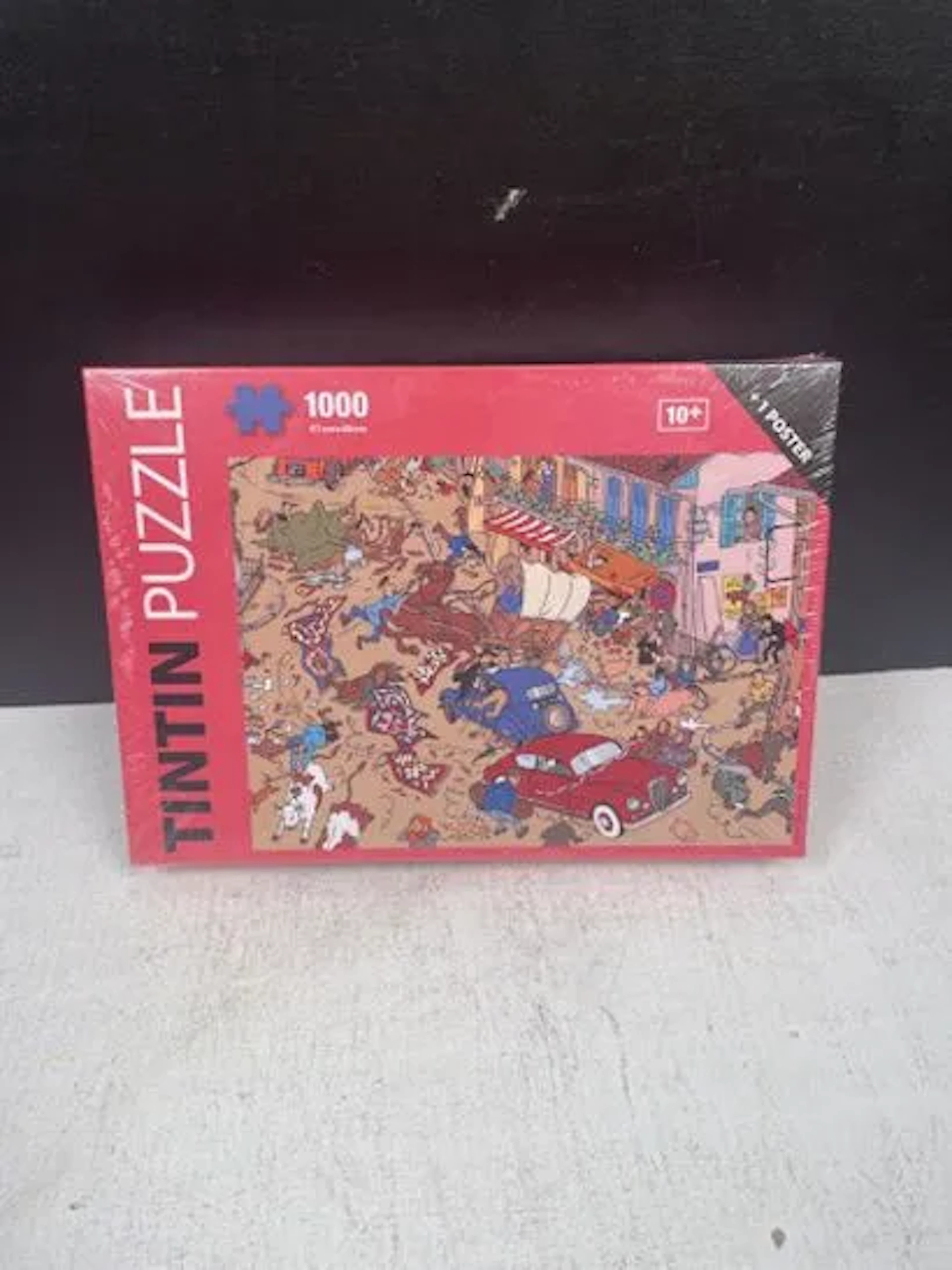 TINTIN (Hergé) - Puzzle 1000 pièces : L'embouteillage / Le c - Lot 239