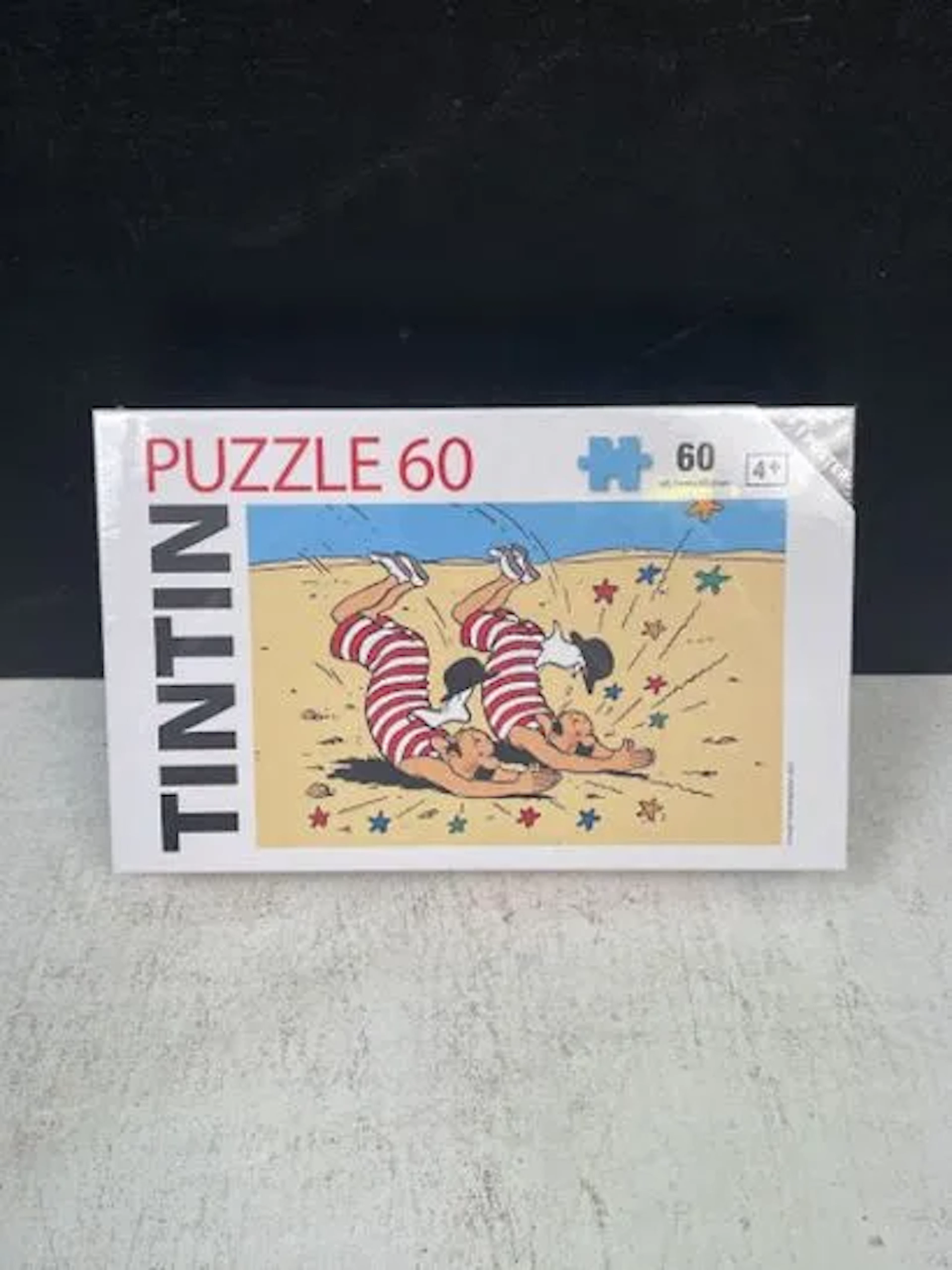 TINTIN (Hergé) - 60-piece puzzle: Thomson and Thompson at th - Lot 236