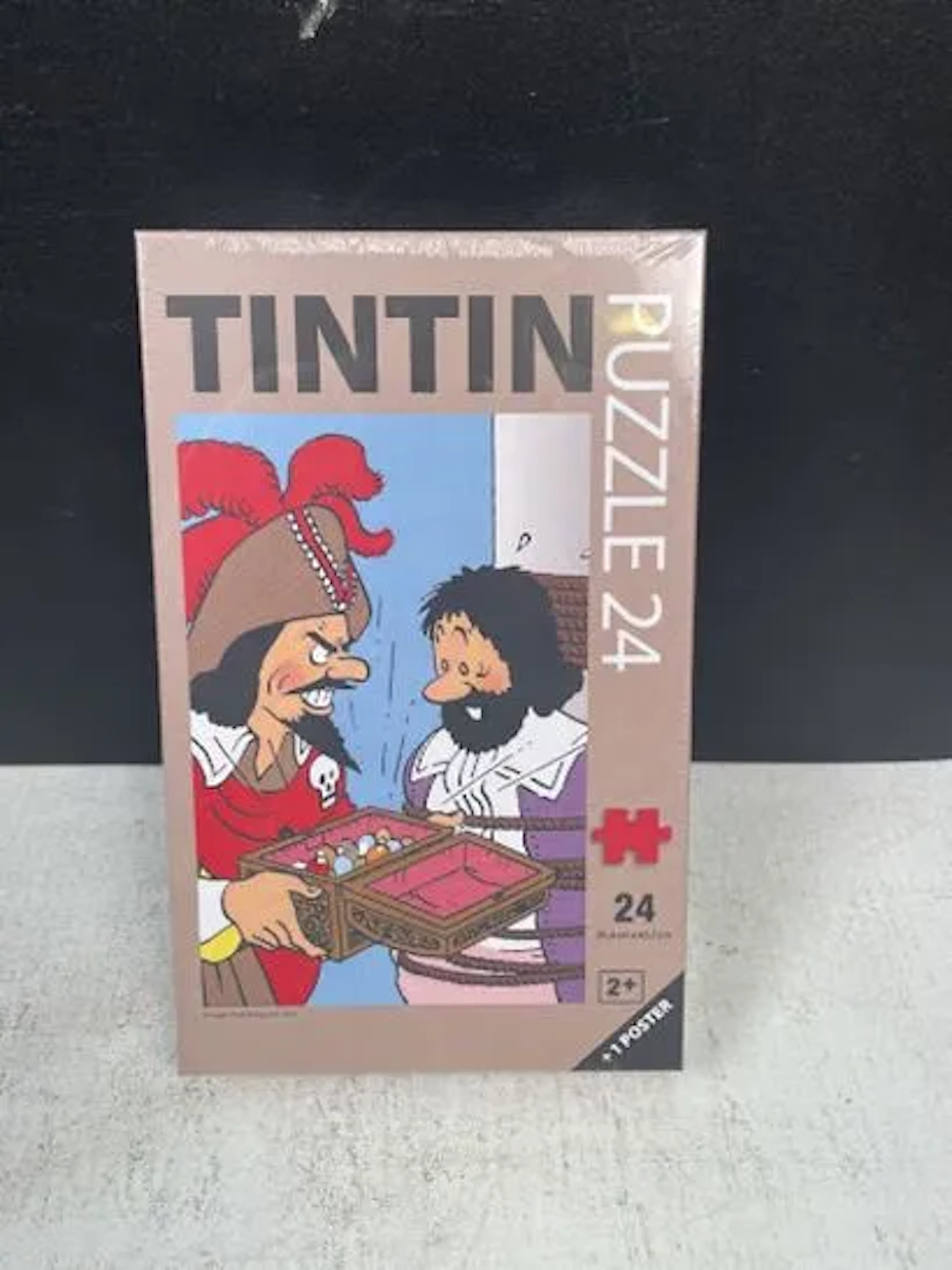 TINTIN (Hergé) - 24-piece puzzle: Red Rackham and Chevalier - Lot 237