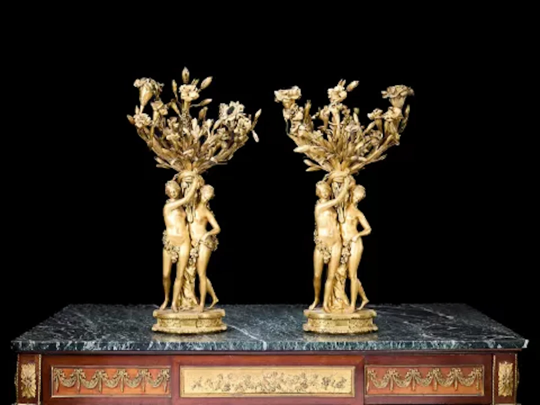 A FINE PAIR OF EARLY 19TH CENTURY GILT BRONZE CANDEALBRA AFTER FALCONET