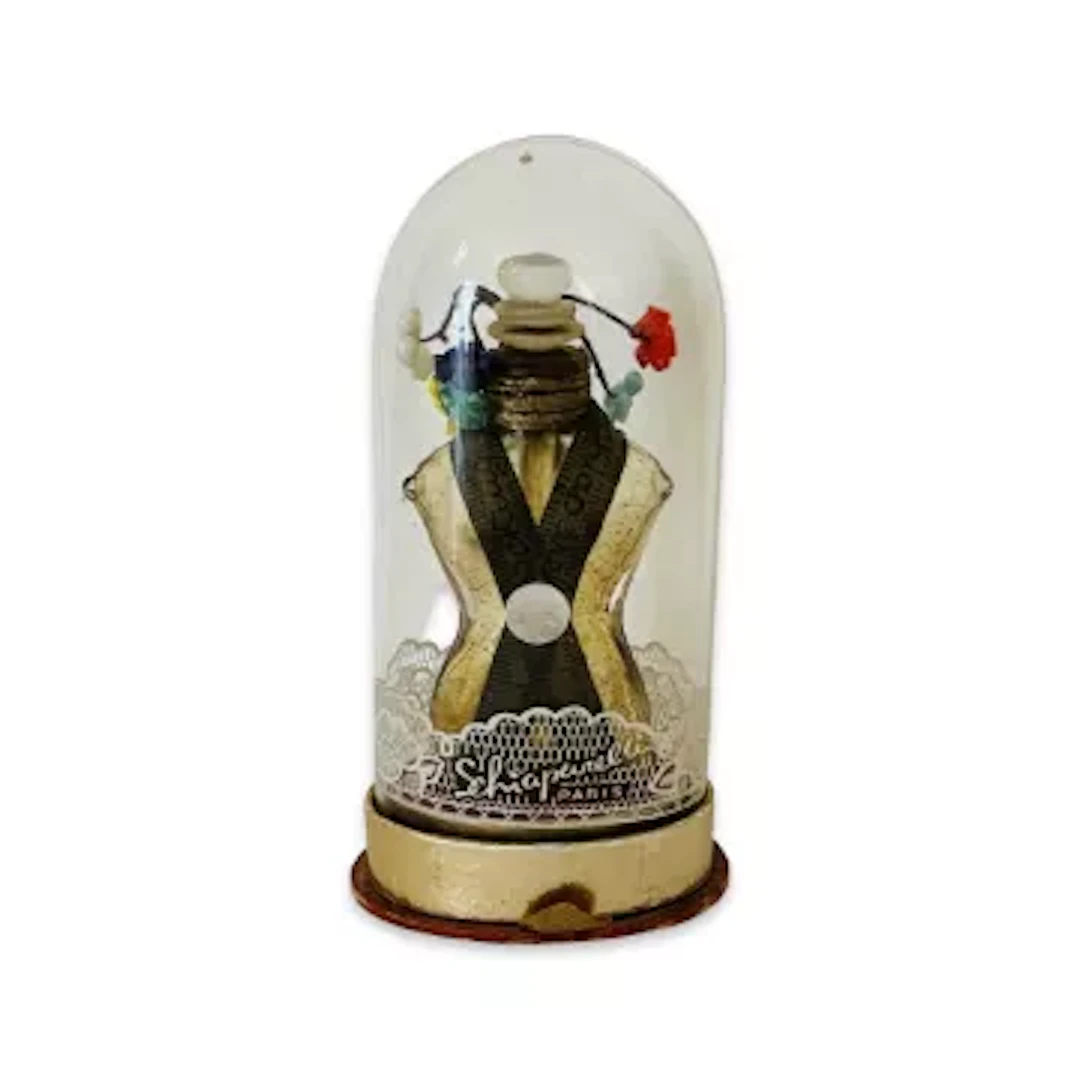 SCHIAPARELLI, PARIS: A TORSO SHAPED PERFUME BOTTLE, C. 1930'S