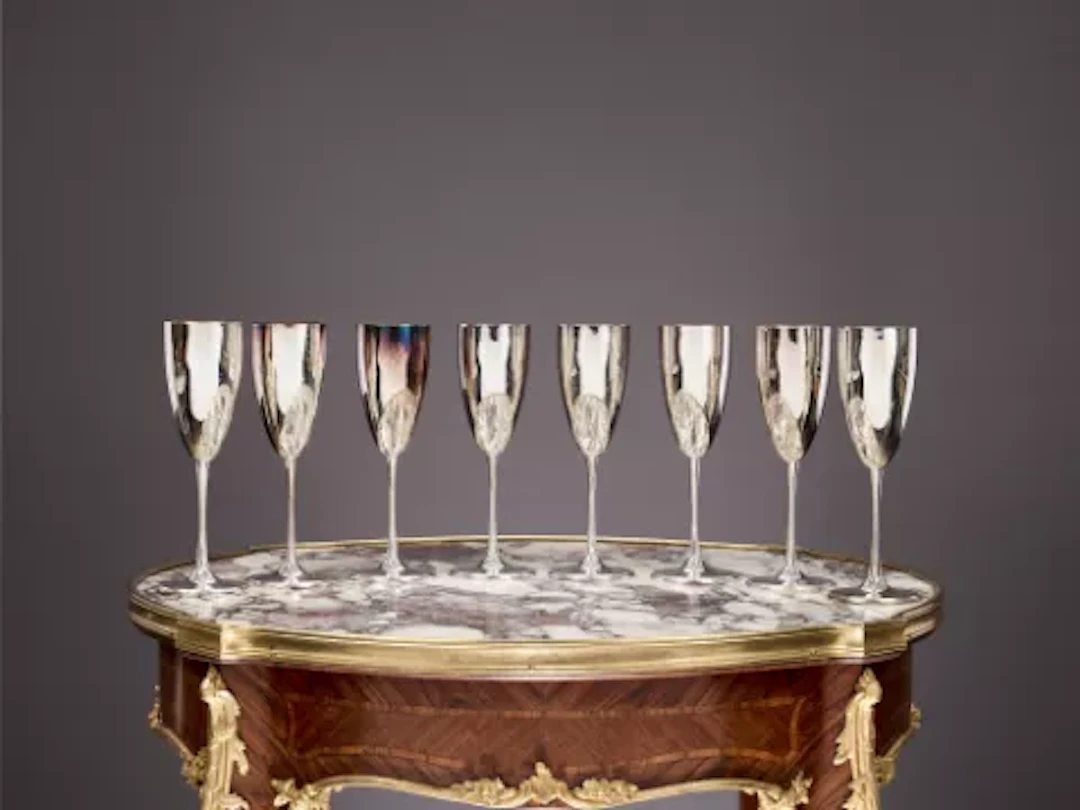 A SET OF EIGHT STERLING SILVER CHAMPAGNE FLUTES, ITALIAN