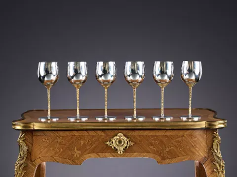 STUART DEVLIN: A SET OF SIX STERLING SILVER AND SILVER GILT MODERNIST