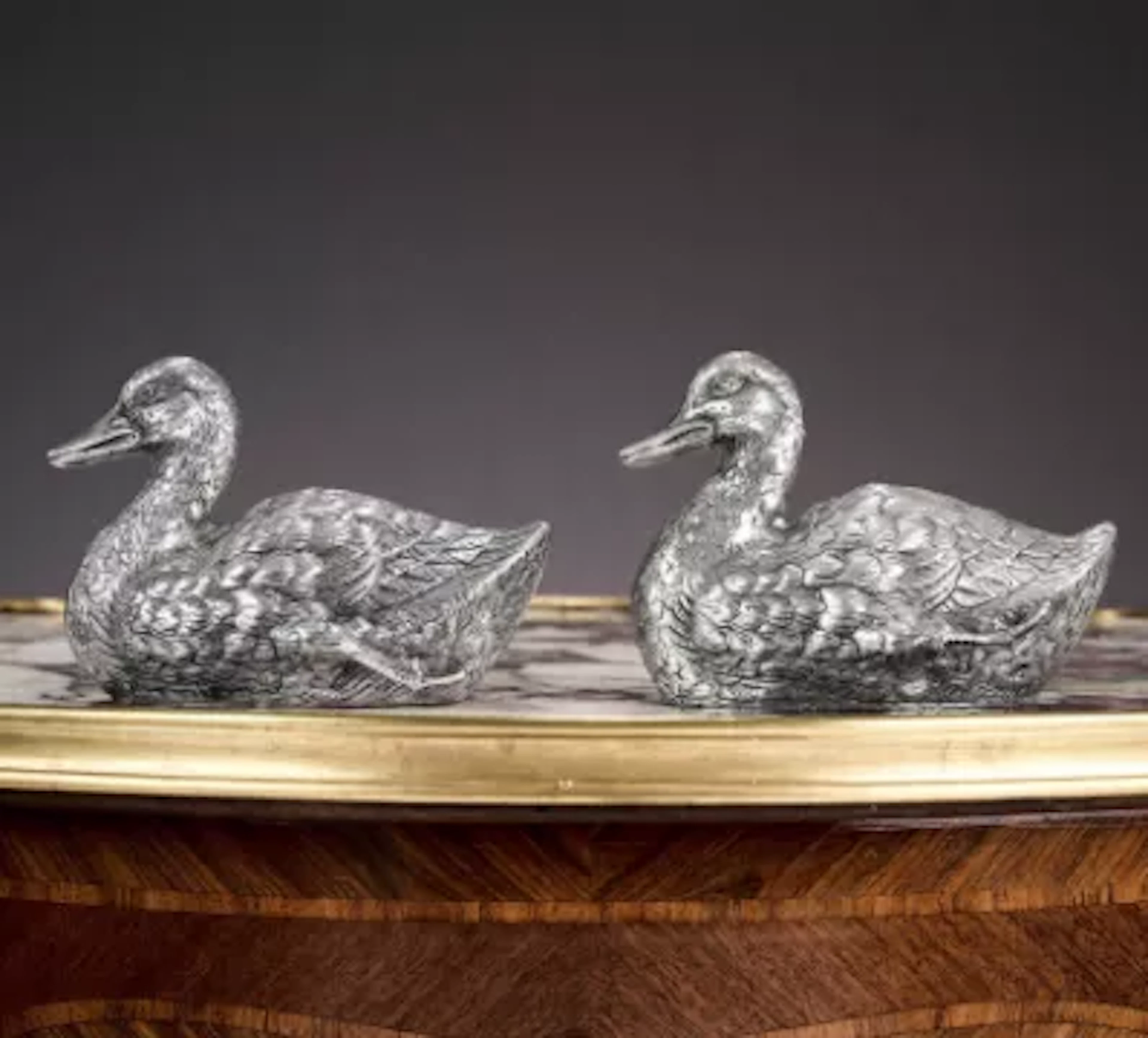 A PAIR OF GERMAN SILVER MODELS OF DUCKS