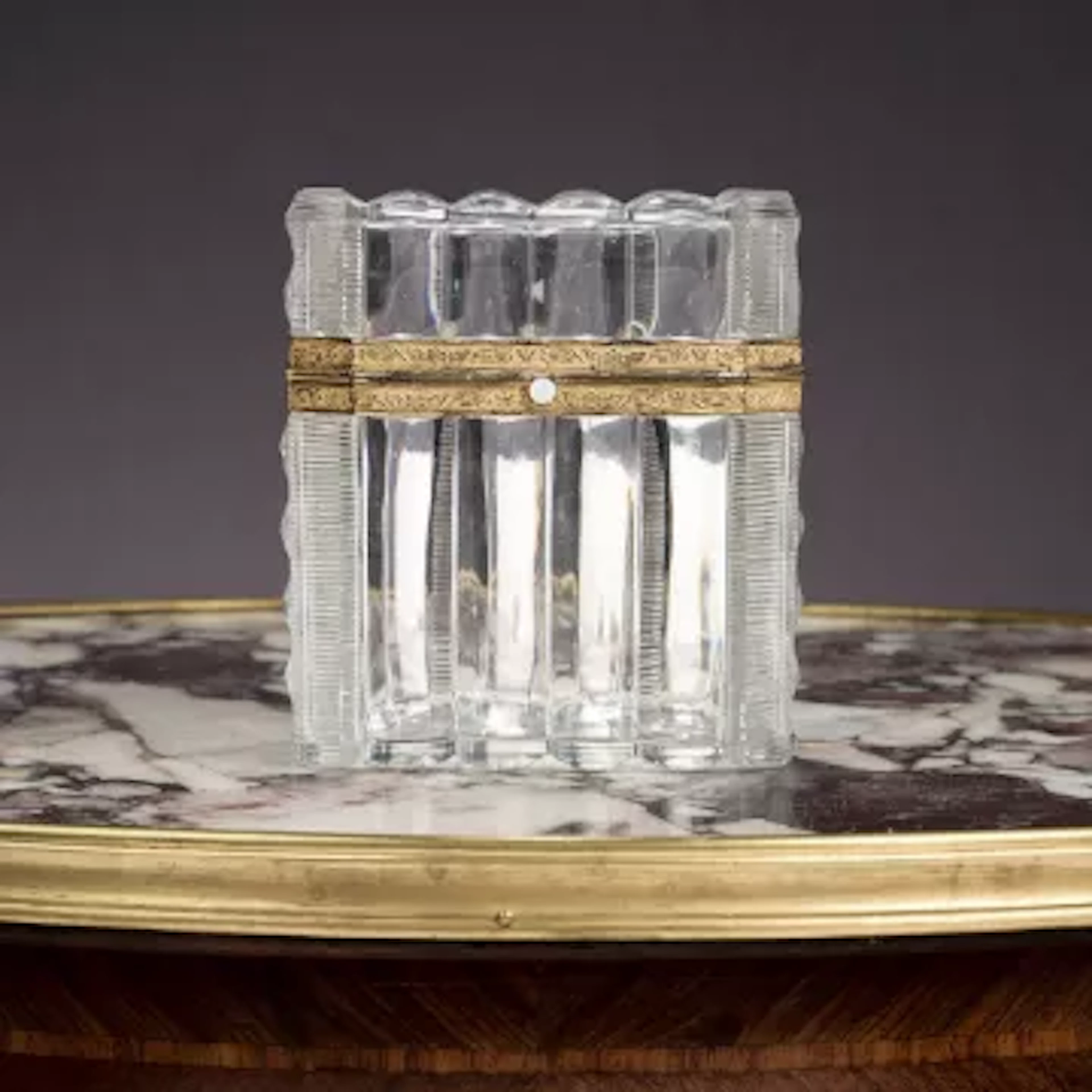 A 19TH CENTURY FRENCH ORMOLU MOUNTED GLASS CASKET, PROBABLY BACCARAT