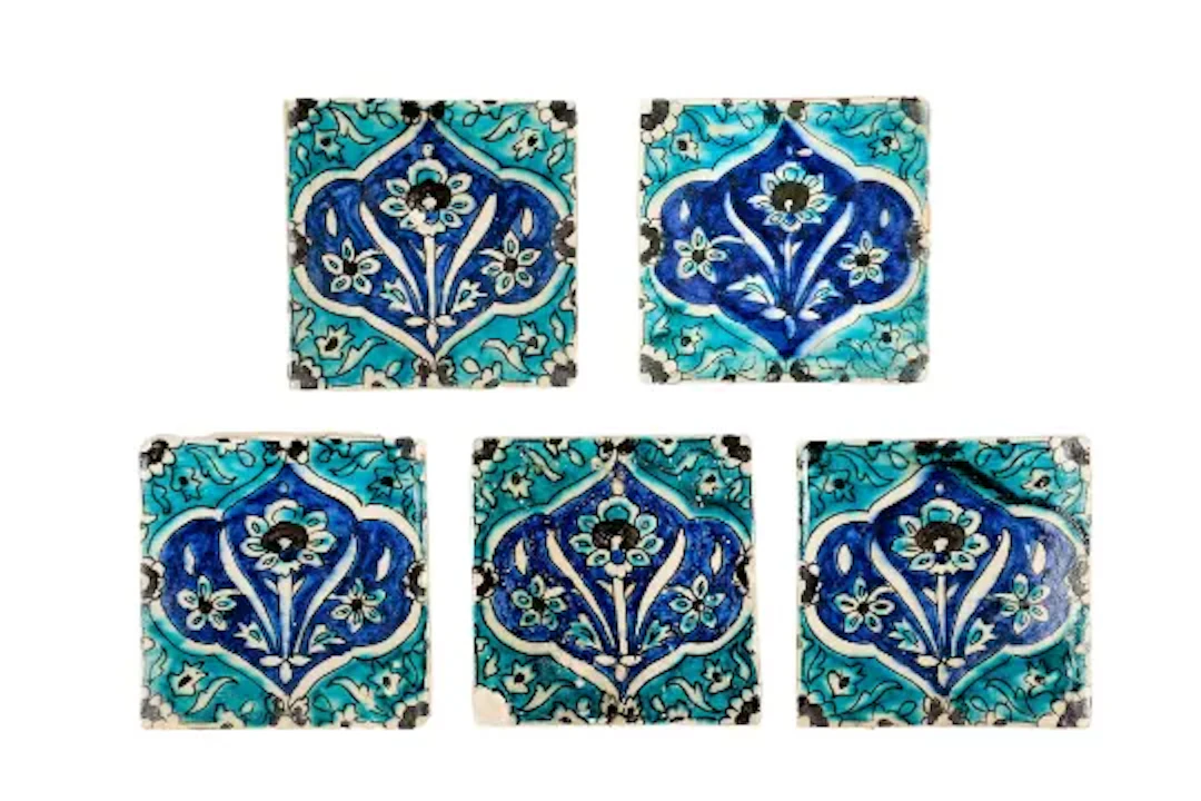 A SET OF FIVE IZNIK TILES, PROBABLY LATE 16TH / EARLY 17TH CENTURY