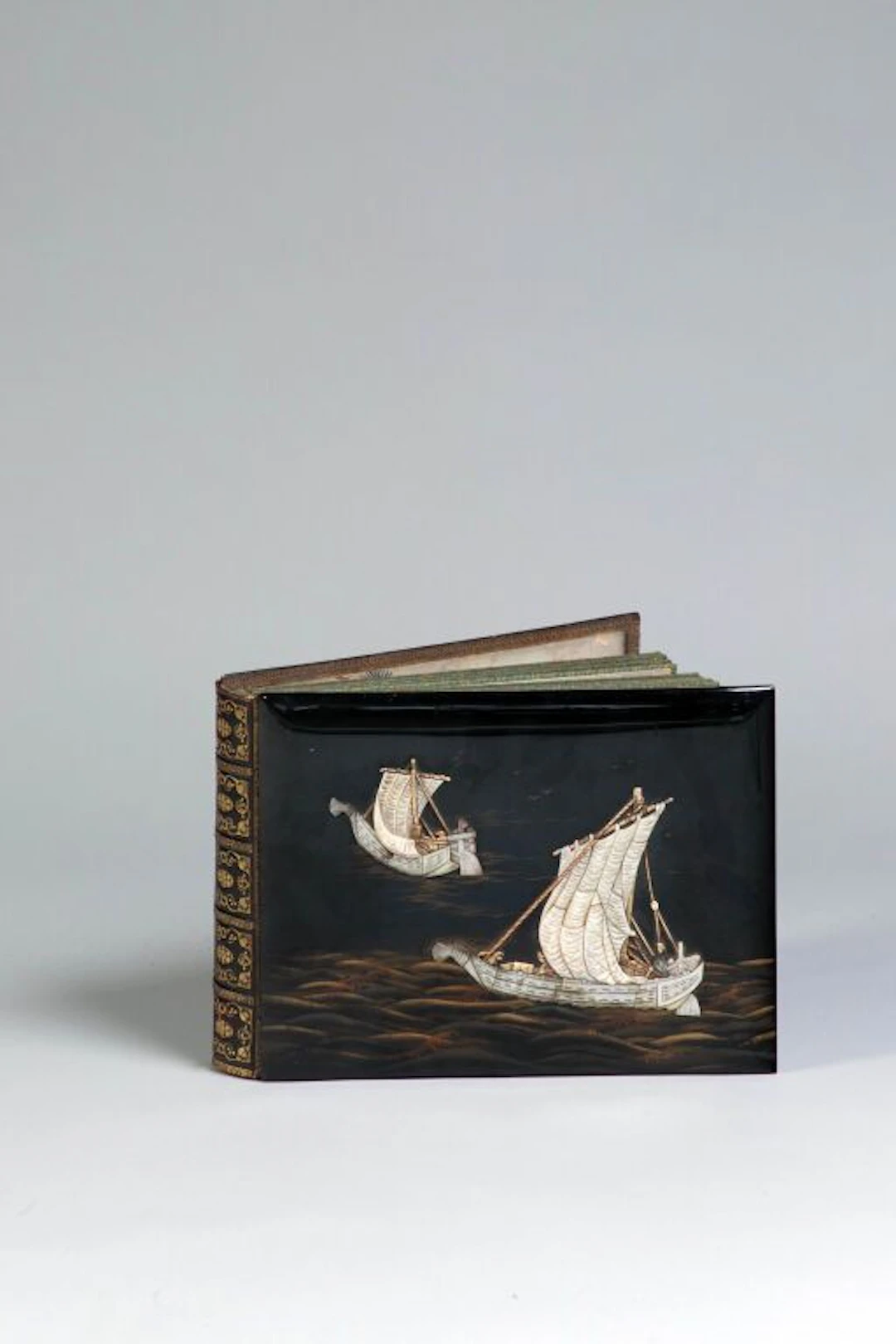 A delightful early 20th-century photo album inspired by Japanese design.