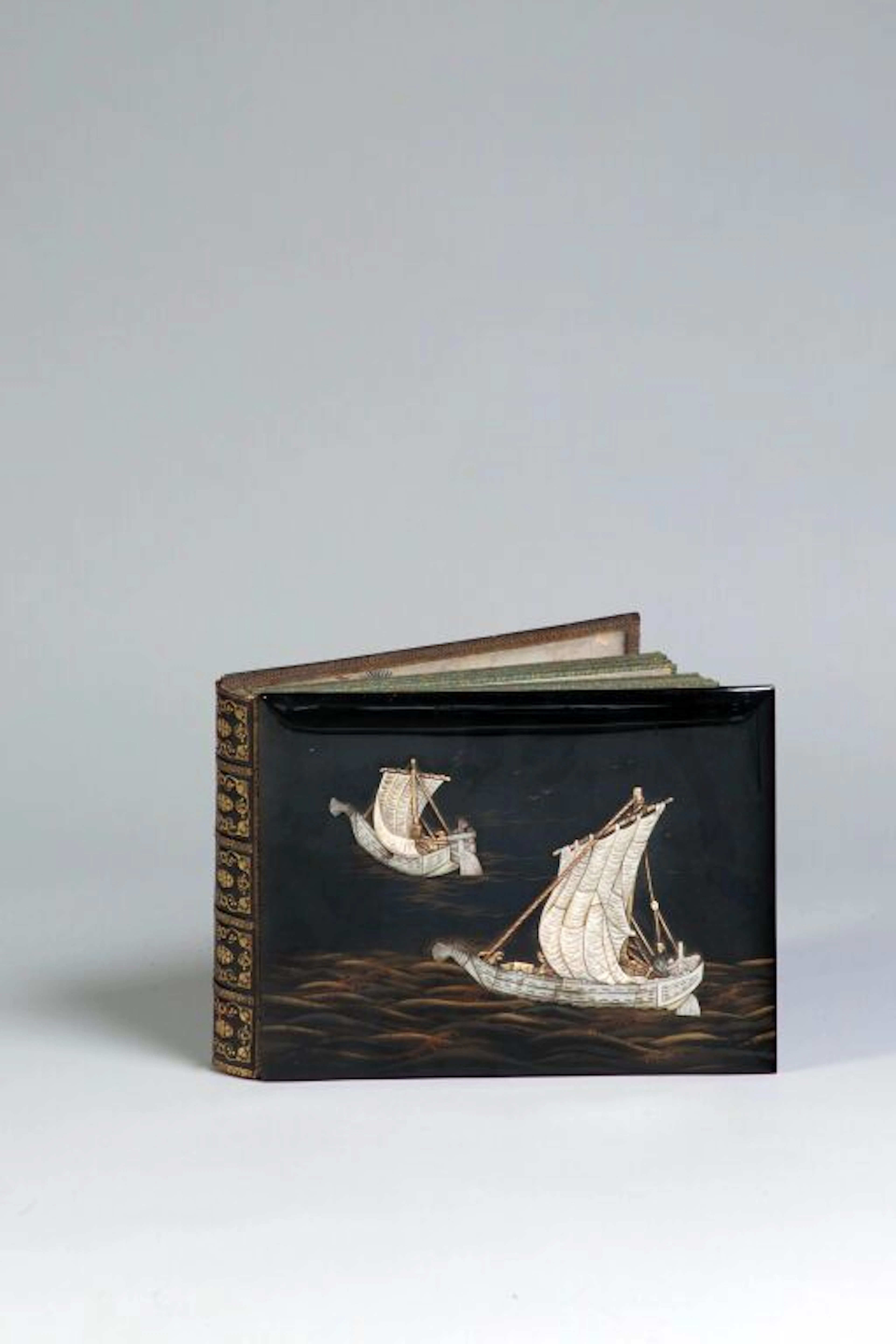 A delightful early 20th-century photo album inspired by Japanese design.