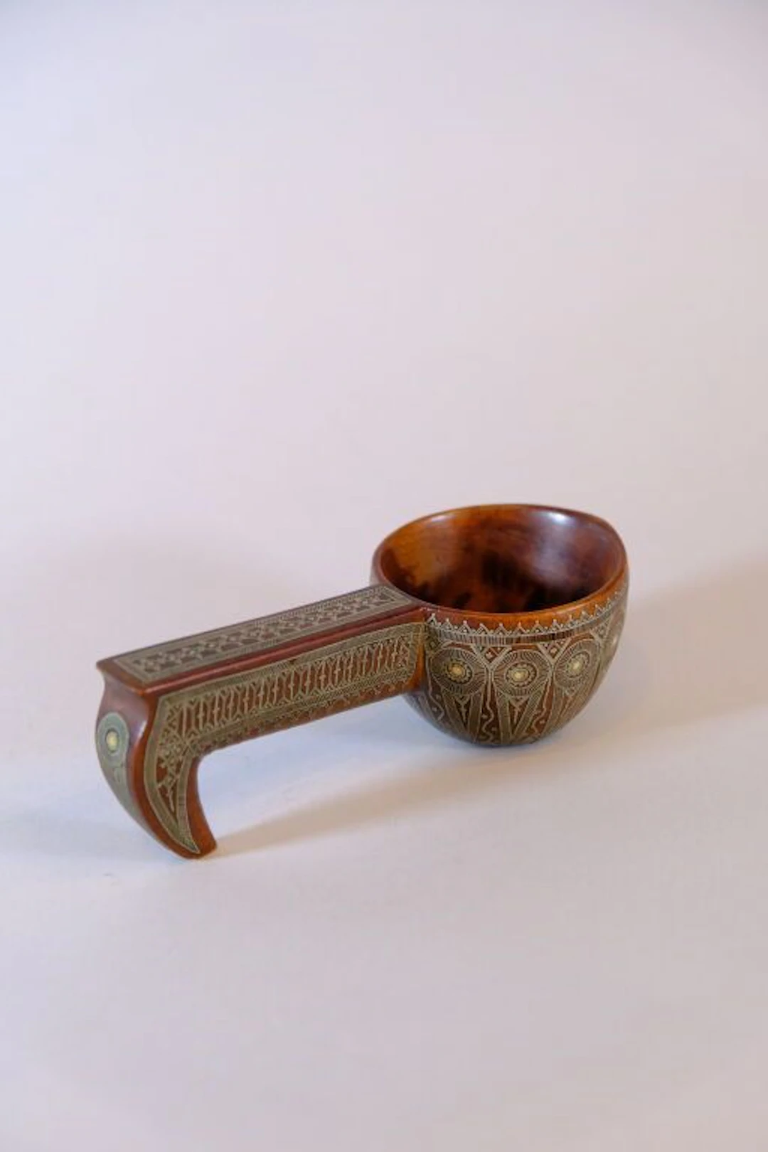 RUSSIA, early 20th century. Wooden kovsh decorated with silver and