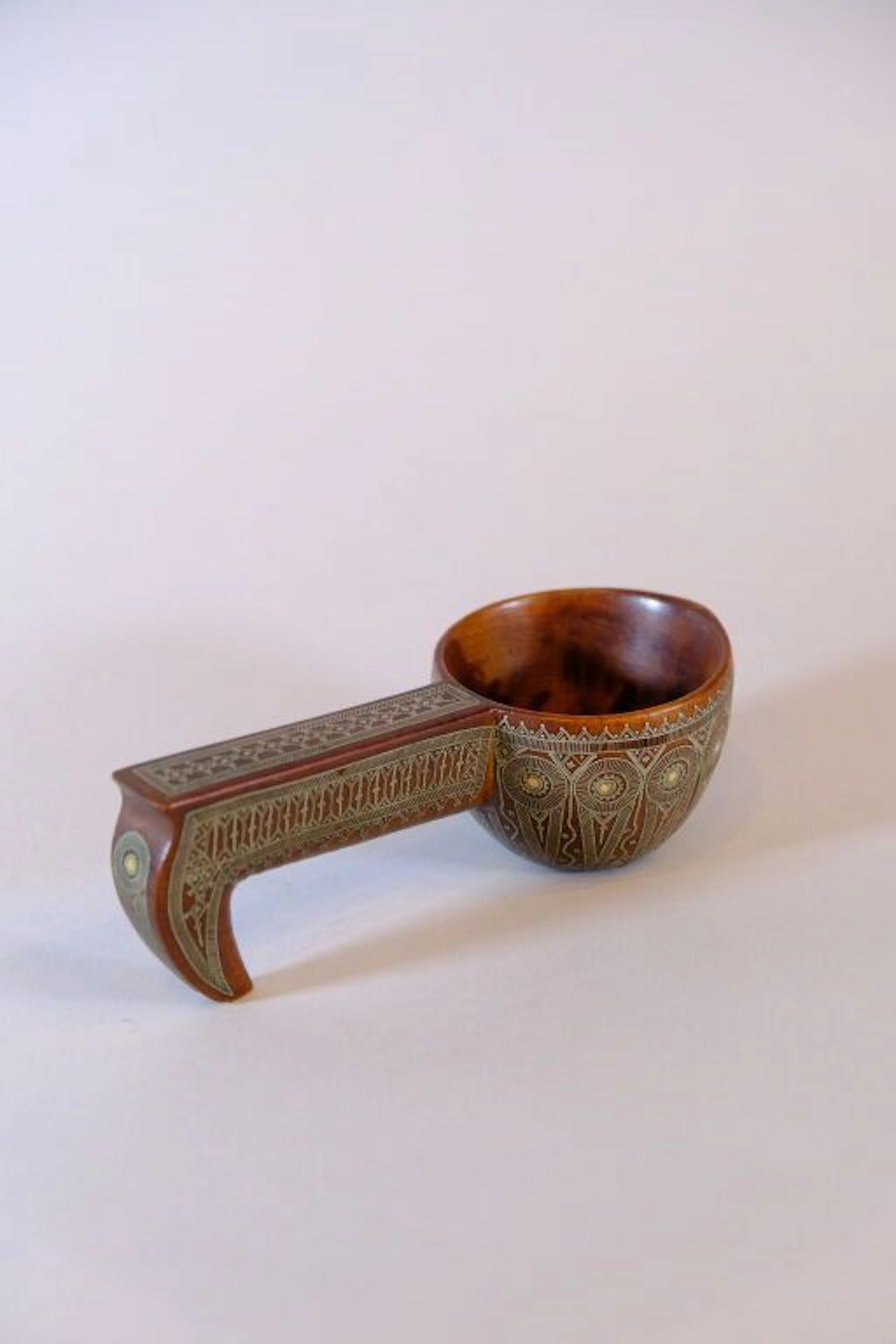 RUSSIA, early 20th century. Wooden kovsh decorated with silver and