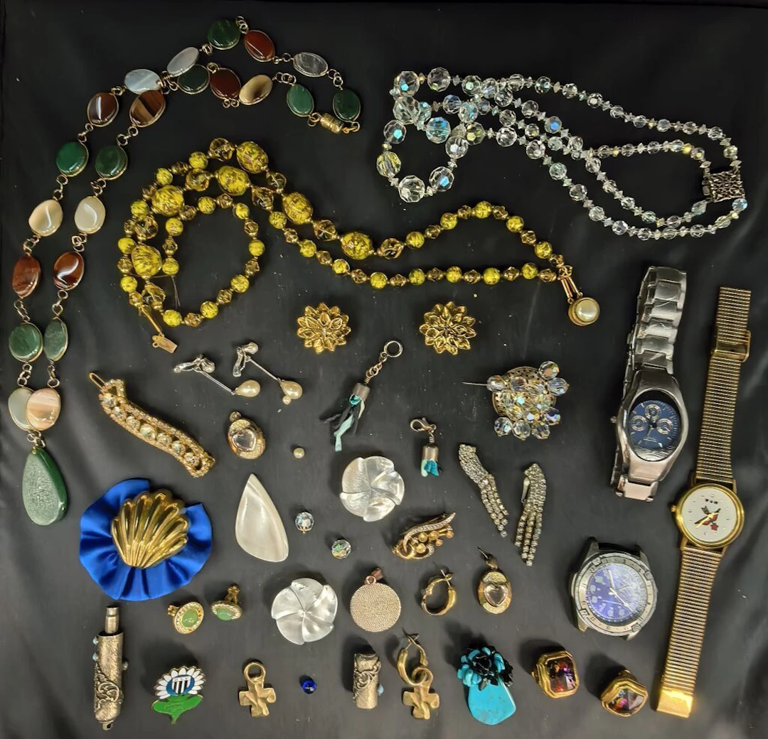 A set of costume jewelry, bordering on endearingly comical, including