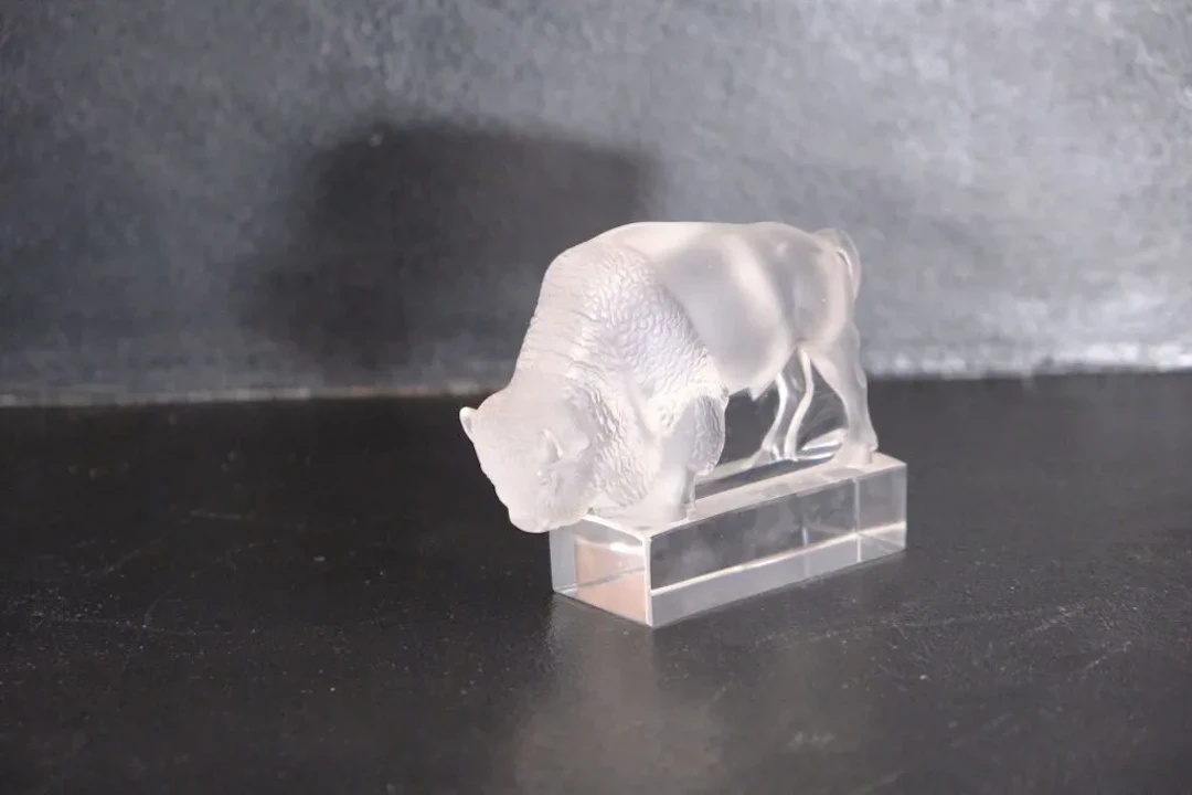 LALIQUE France. Pressed and molded glass bison. Signed on the base.