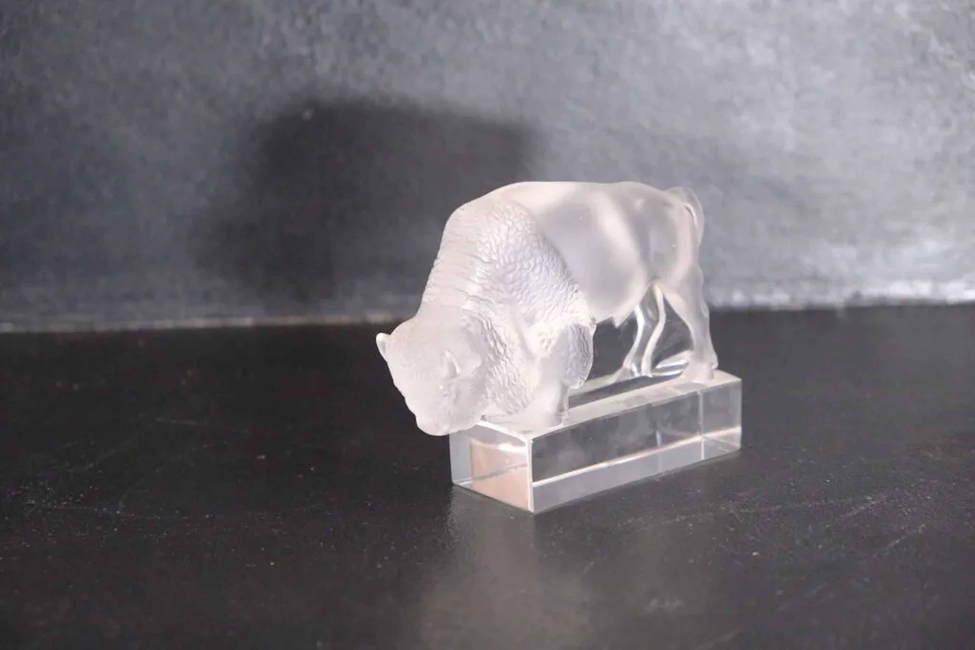 LALIQUE France. Pressed and molded glass bison. Signed on the base.