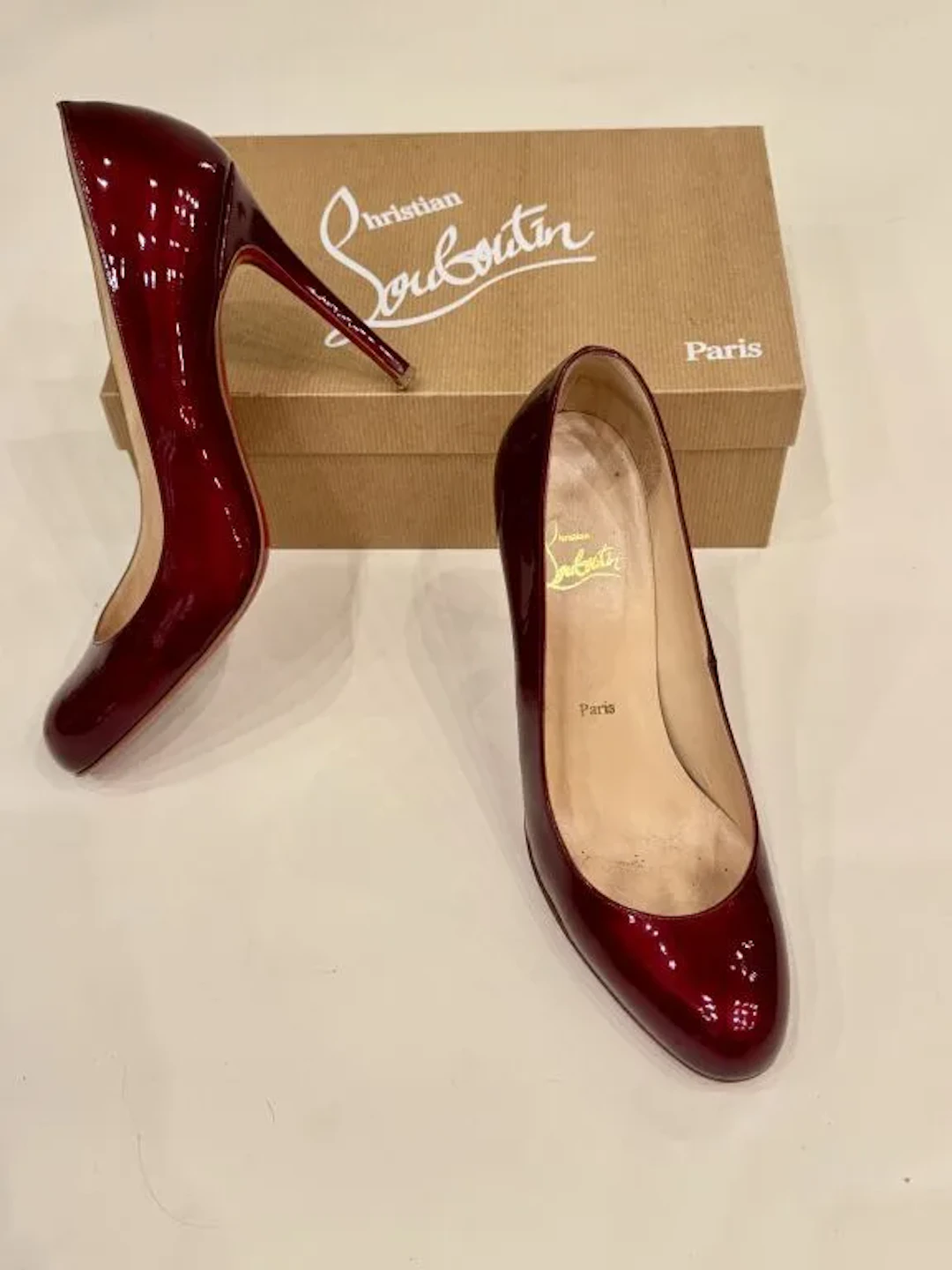 CHRISTIAN LOUBOUTIN Paris Pair of metallic red patent leather stiletto
