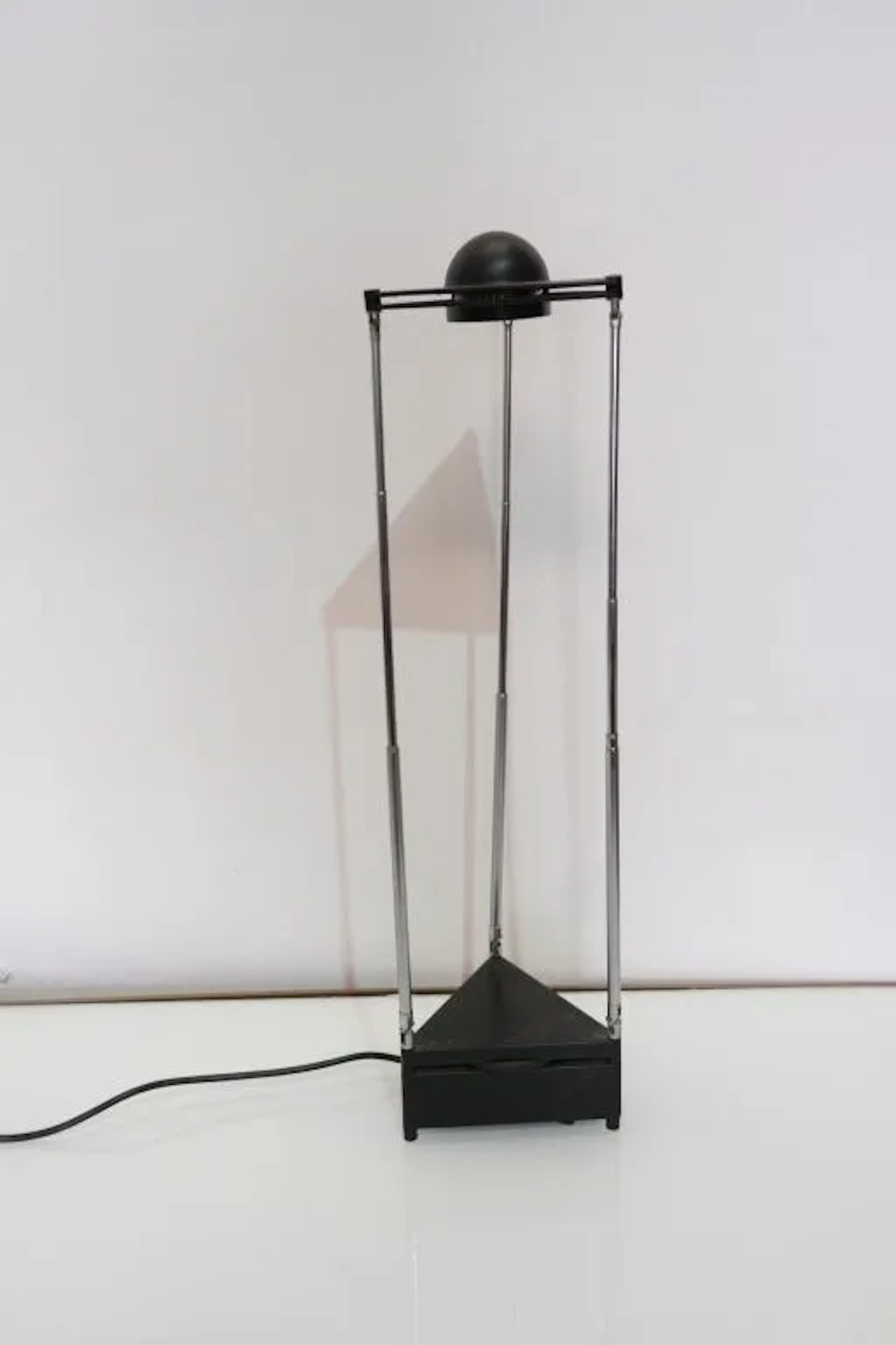 LUCI Kandido model. Triangular living room lamp, designed by F. A.