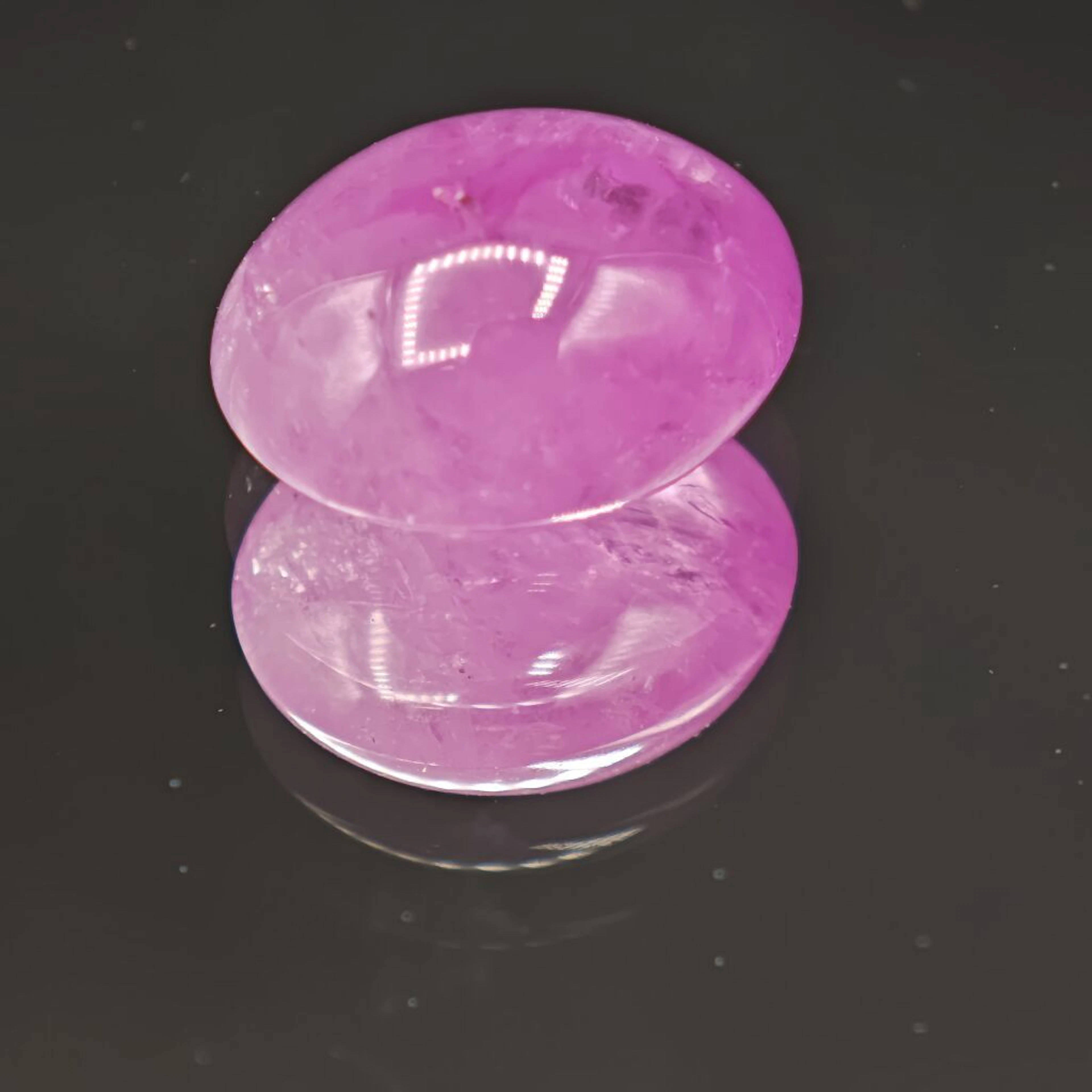 Cabochon-cut ruby, baby-pink in color, weighing 15.32 carats. Dimensions: