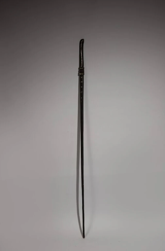 Ebony walking stick inlaid with mother-of-pearl depicting a stylized